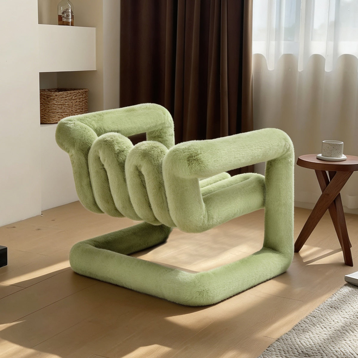 Rear angled view of the avocado green 36.5°C Series large sculptural lounge chair showing its looped frame
