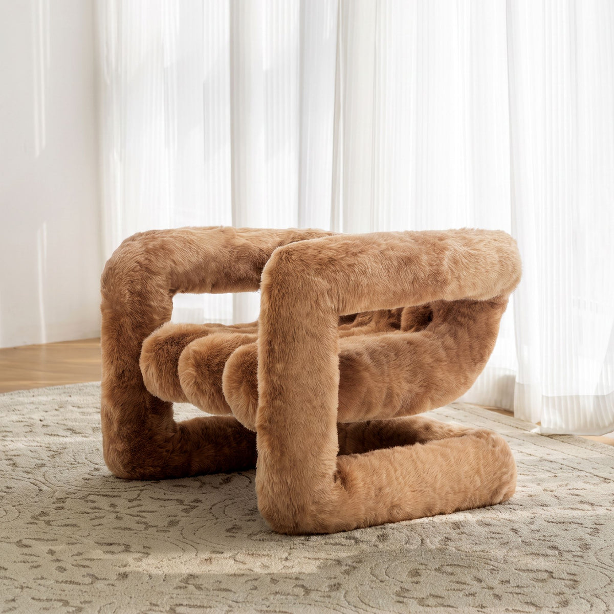 Rear angled view of the brown 36.5°C Series large eco-fur lounge chair showing its cantilevered sculptural frame