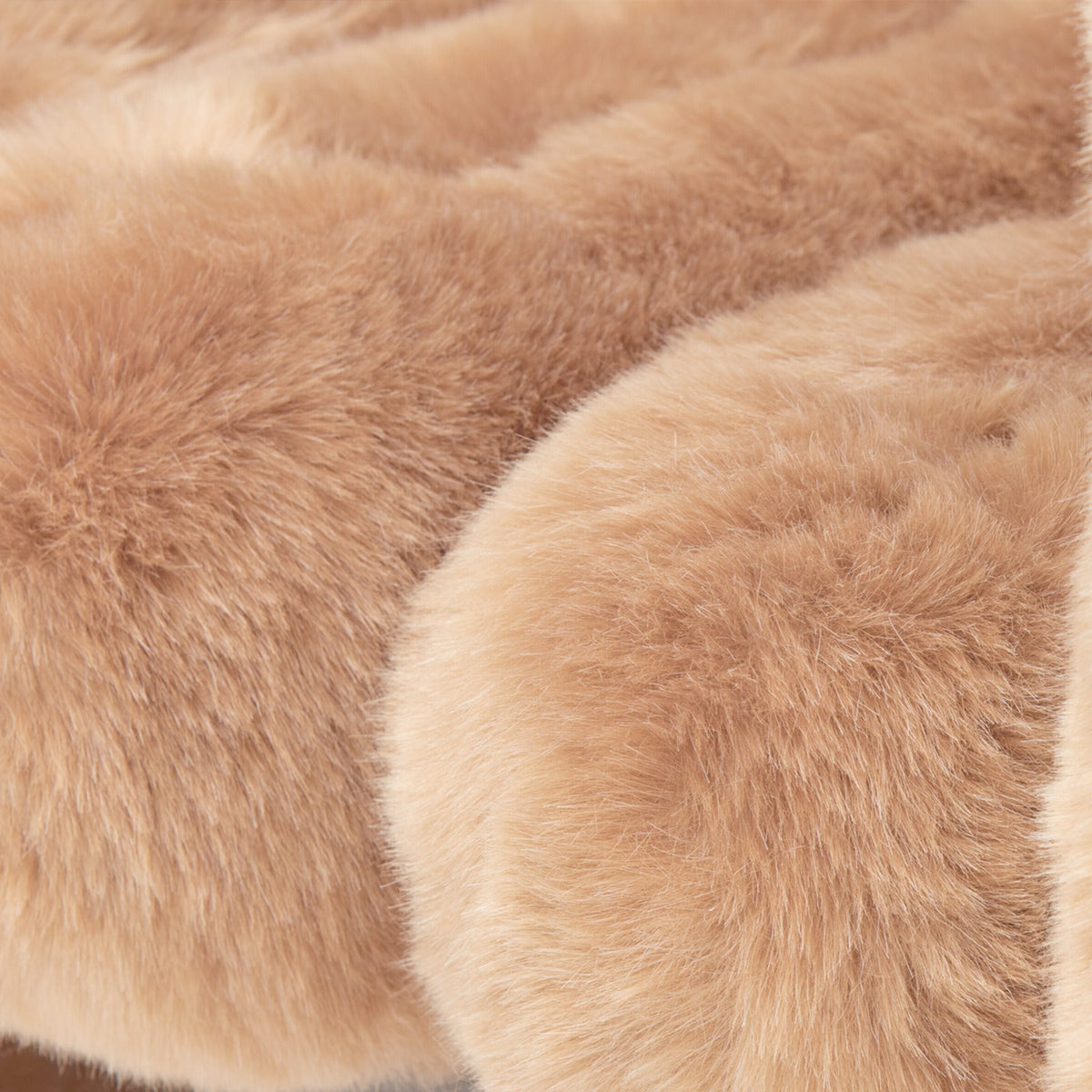 Close-up of brown eco-fur upholstery on the 36.5°C Series large lounge chair showing its soft plush texture