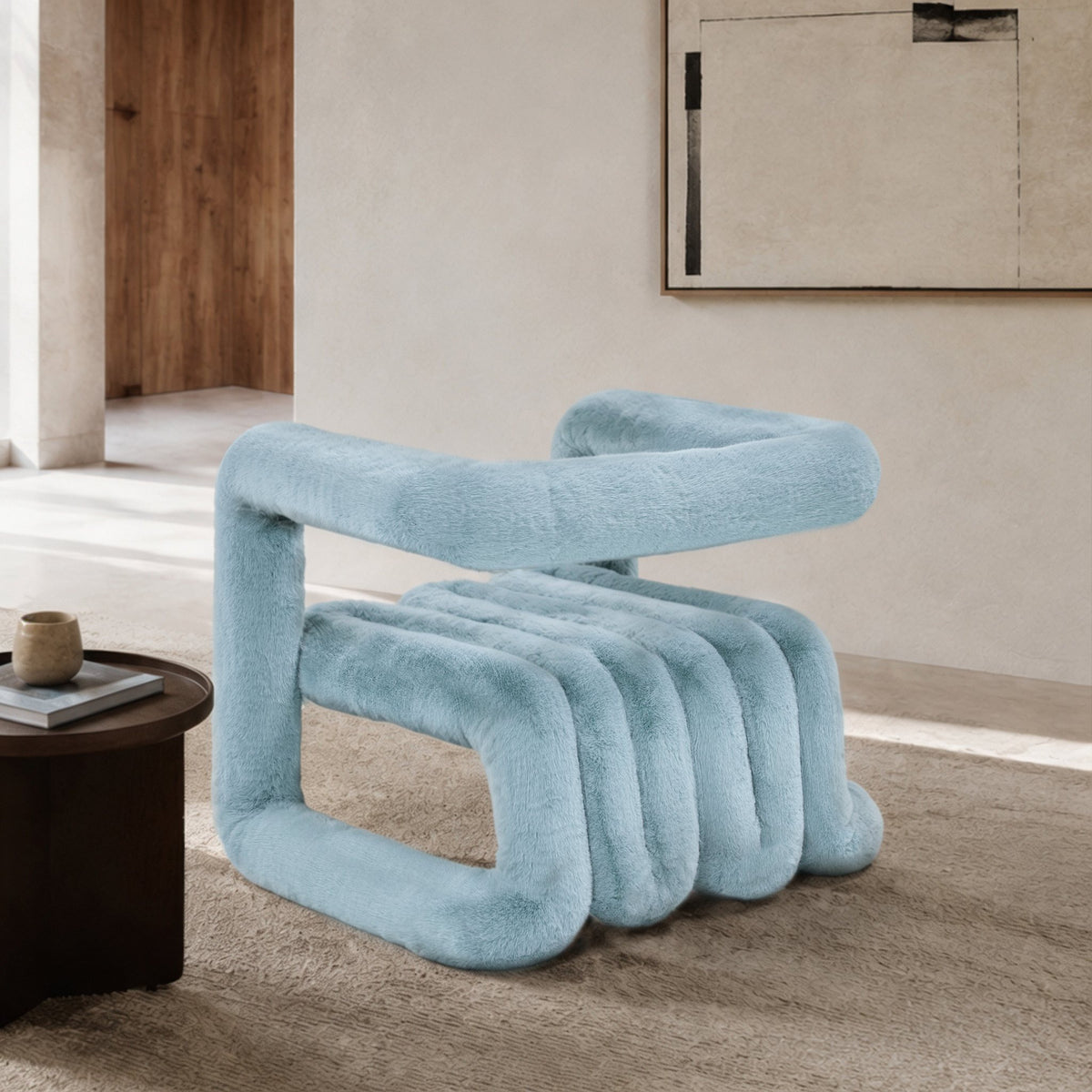Side angled view of the light blue 36.5°C Series eco-fur lounge chair with plush channelled seating and cantilevered structure