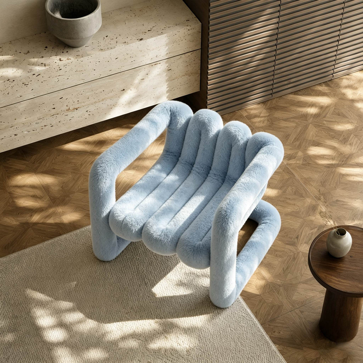 Overhead view of the light blue 36.5°C Series large sculptural lounge chair showing its channelled seat and curved frame