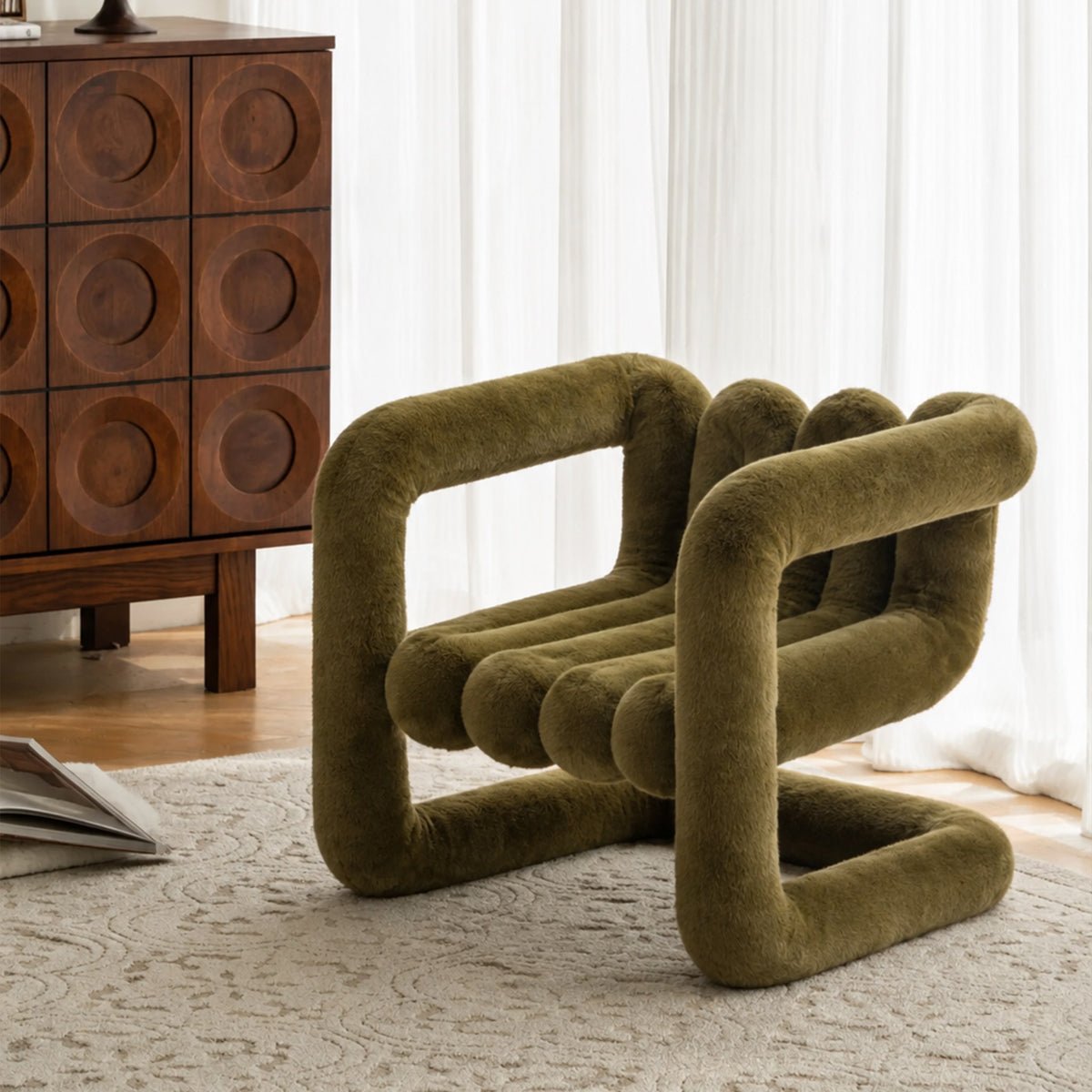 Angled view of the olive green 36.5°C Series eco-fur lounge chair with sculptural cantilevered frame