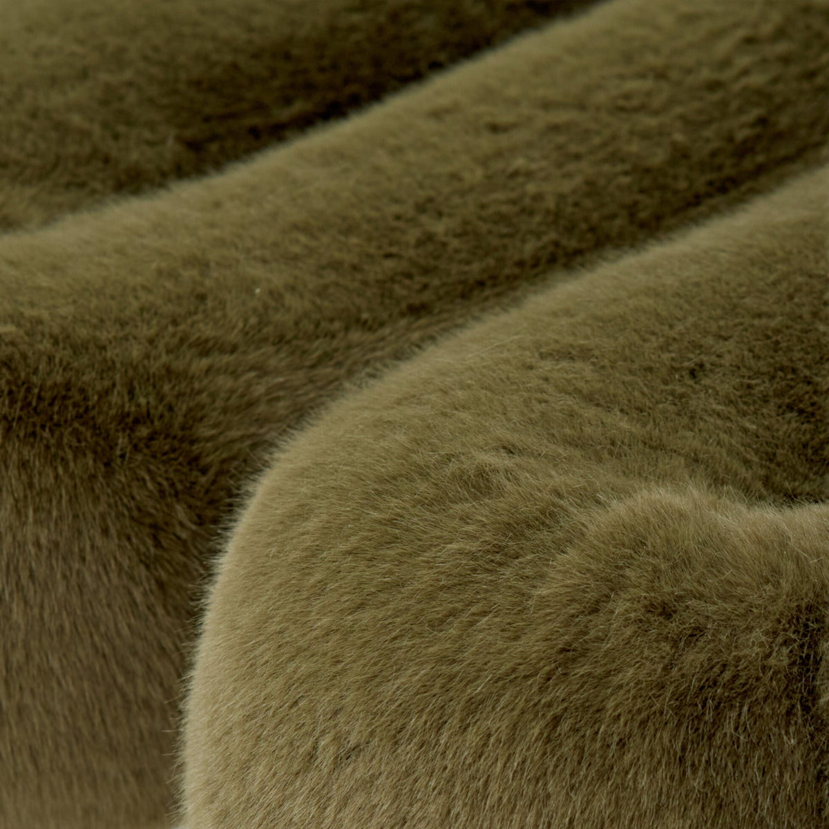 Close-up of olive green eco-fur upholstery on the 36.5°C Series large sculptural lounge chair