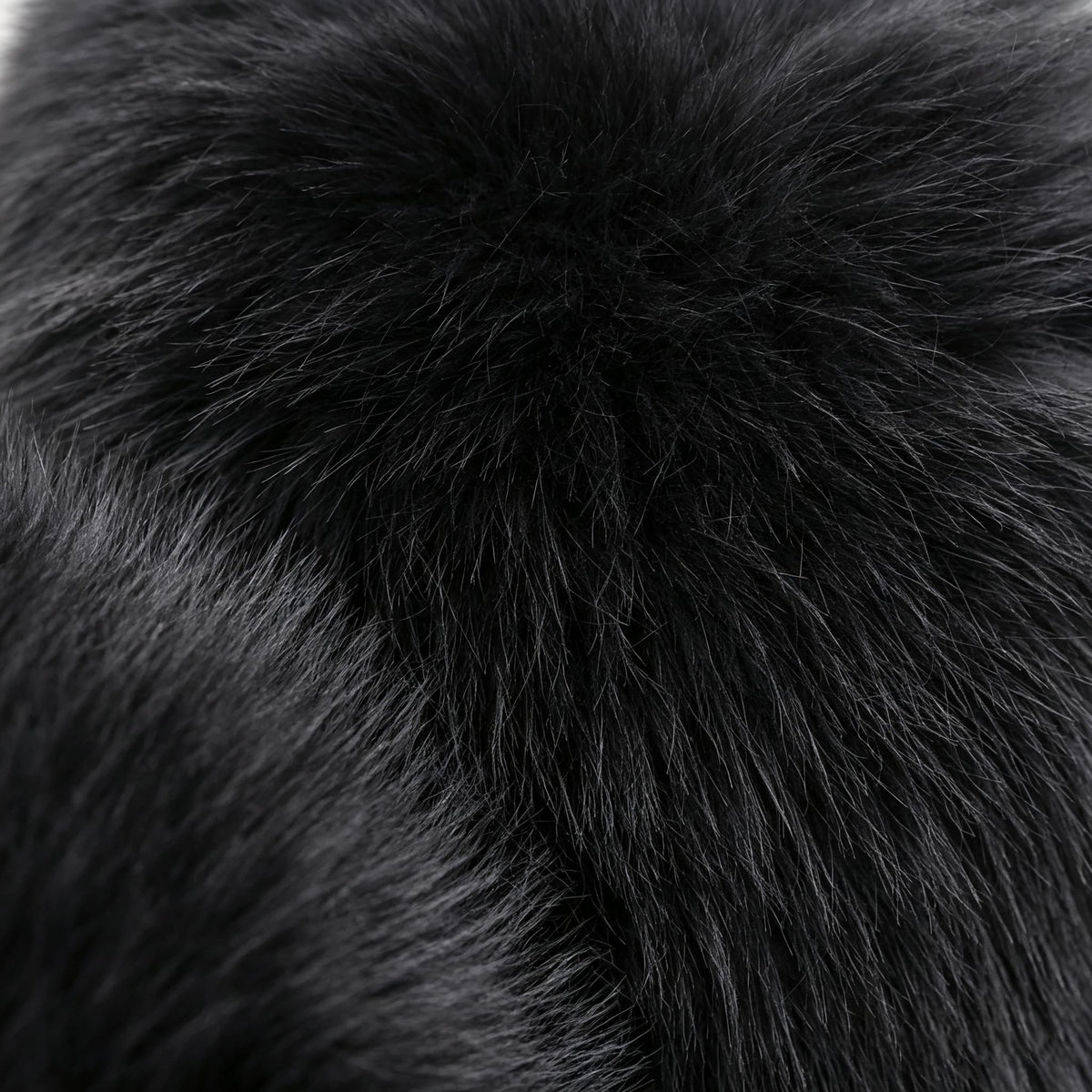Close-up of black eco-fur upholstery on the 36.5°C Series Medium-L chair showing its dense soft fibre texture