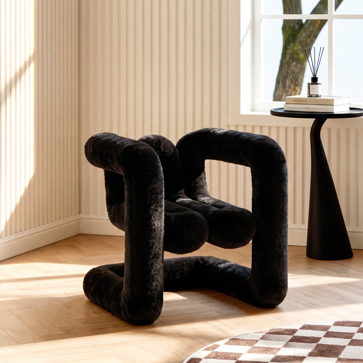 Side view of the black 36.5°C Series Medium-L lounge chair with looped frame and plush eco-fur upholstery