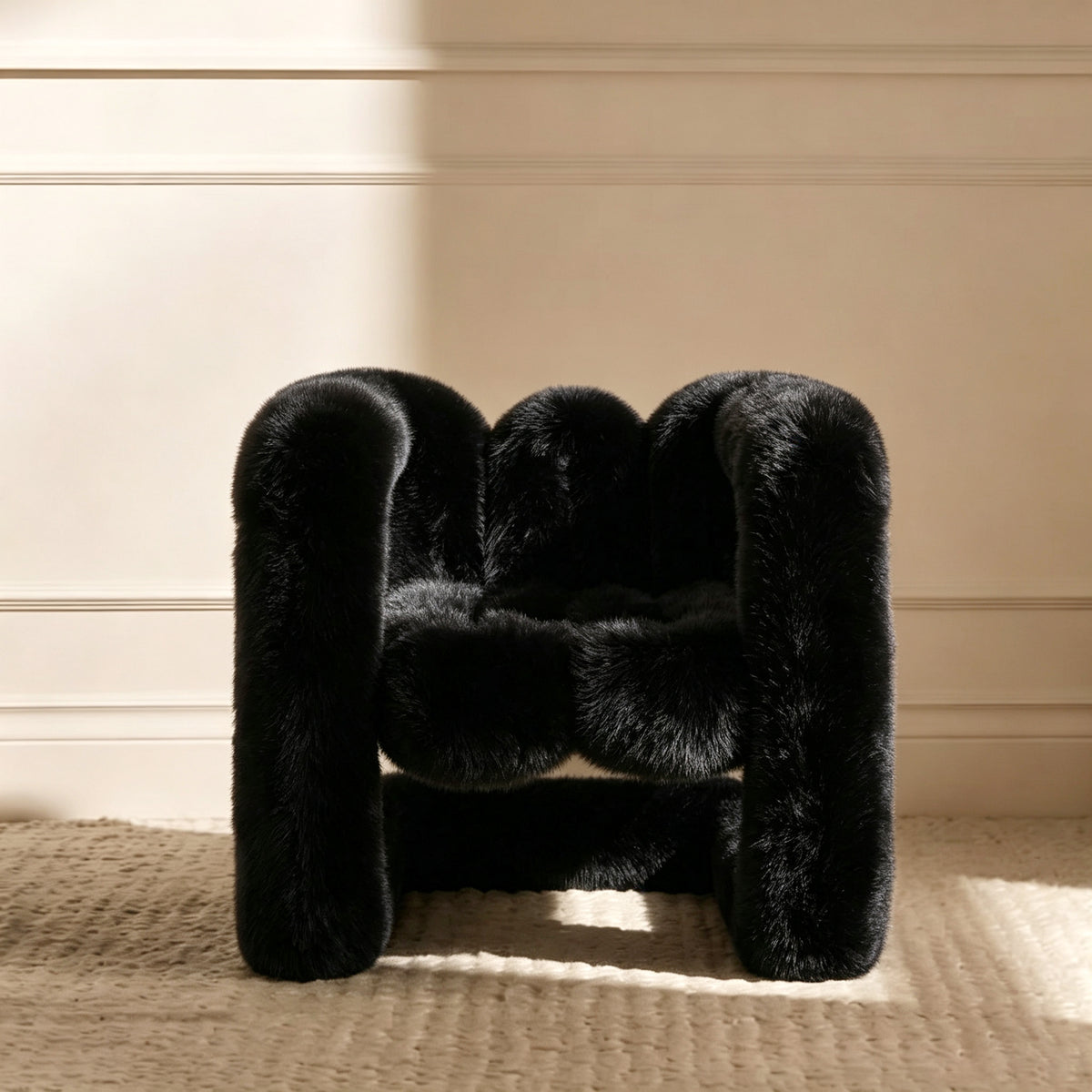 Black 36.5°C Series Medium-L plush chair with rounded sculptural frame and soft eco-fur upholstery
