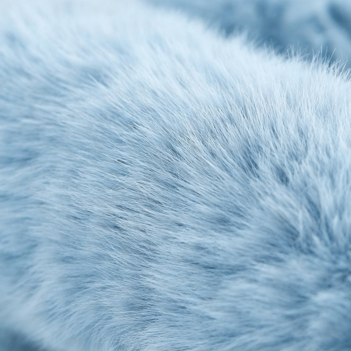 Close-up of blue eco-fur upholstery on the 36.5°C Series Medium-L chair showing its soft plush fibre texture
