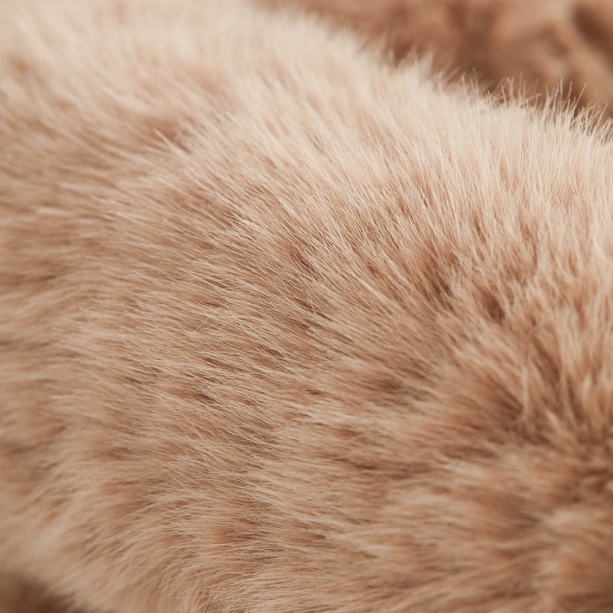 Close-up of brown eco-fur upholstery on the 36.5°C Series Medium-L chair showing its soft layered fibre texture