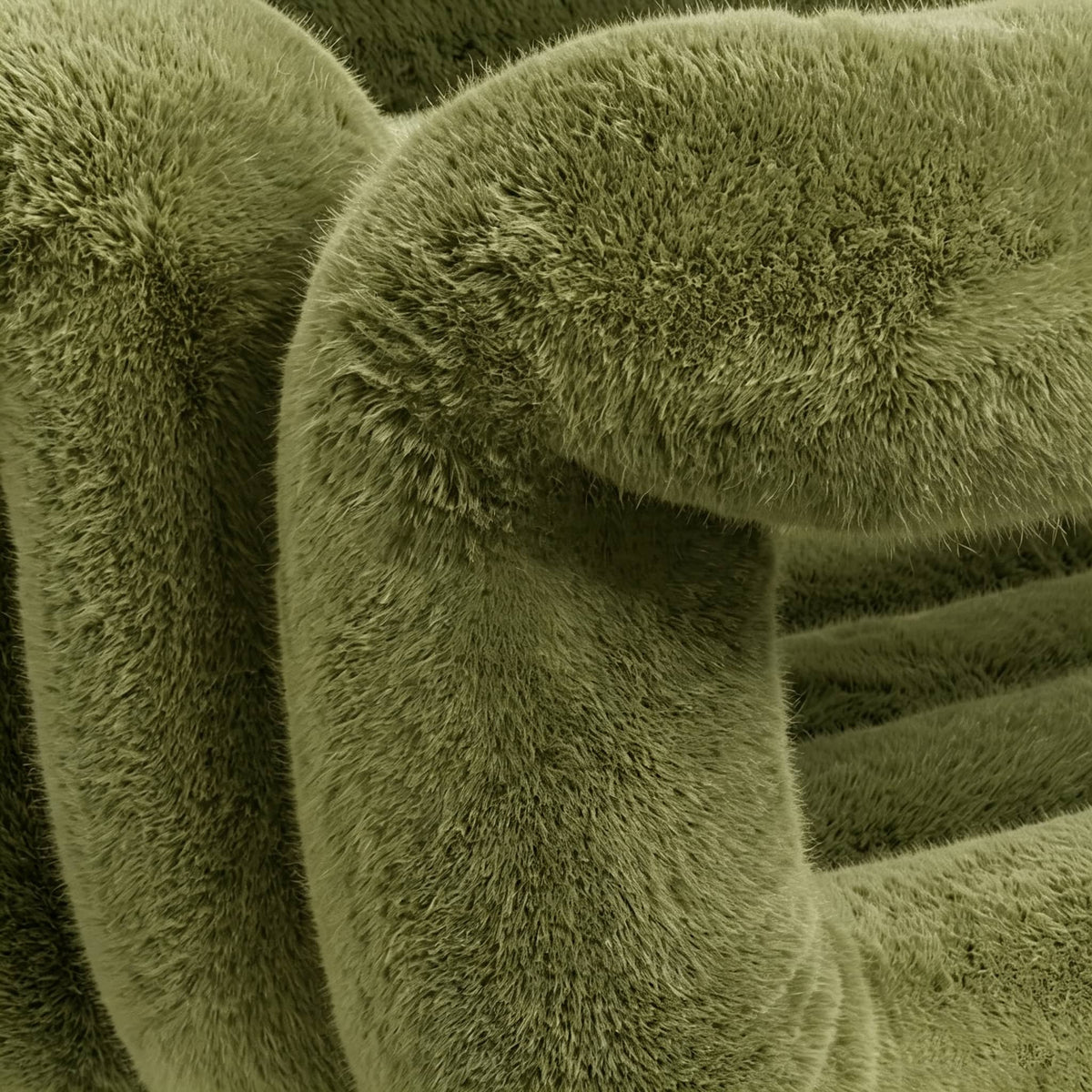 Close-up of deep green eco-fur upholstery on the 36.5°C Series Medium-L chair showing its dense plush fibre texture