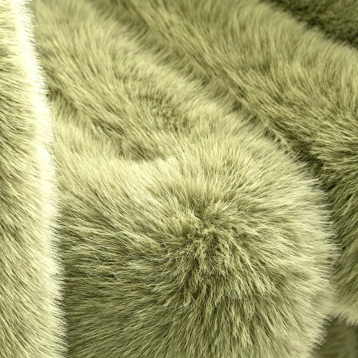 Close-up of green eco-fur upholstery on the 36.5°C Series Medium-L chair showing its soft dense fibre texture