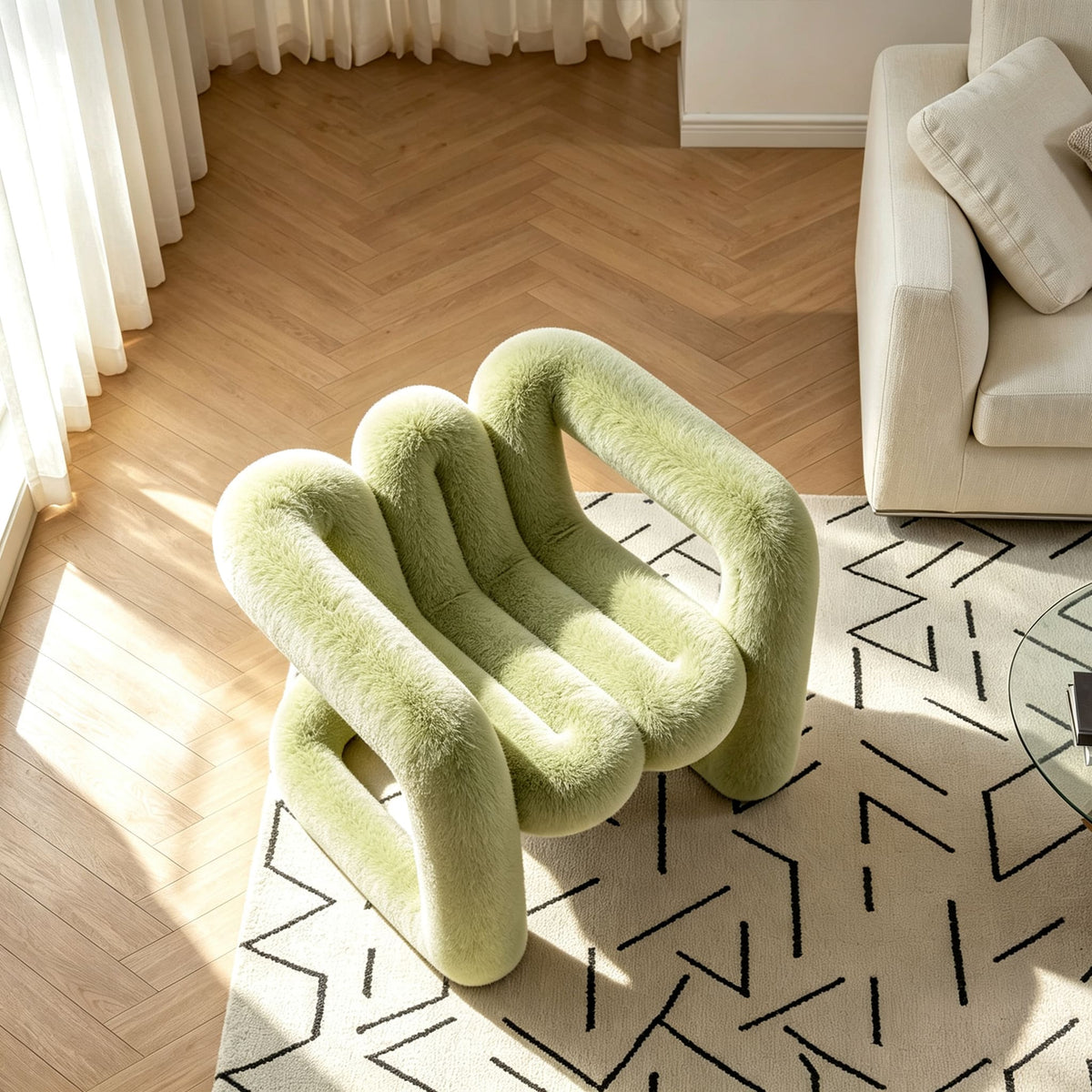 Top view of the green 36.5°C Series Medium-L plush chair showing its curved frame and segmented seat design