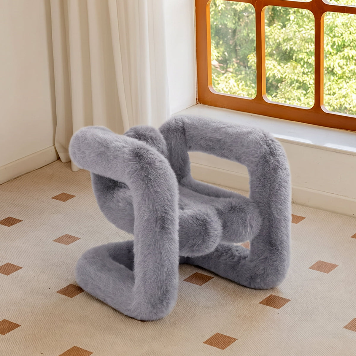 Grey 36.5°C Series Medium-L sculptural accent chair with plush eco-fur upholstery beside a sunlit window