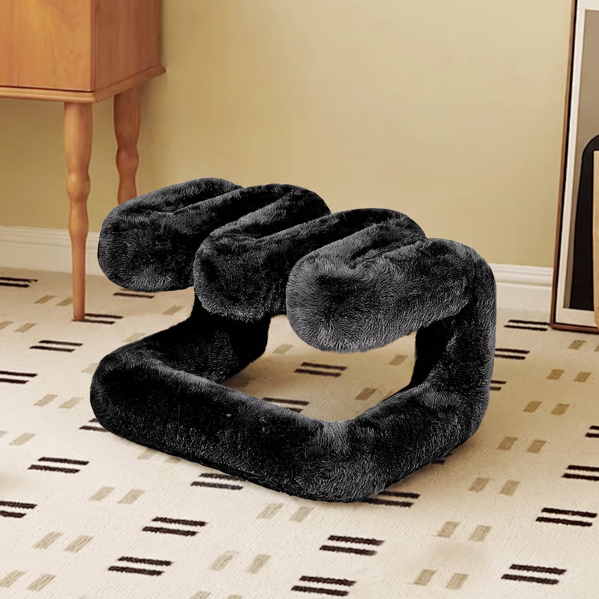 Black eco-fur 36.5°C Series Plush Stool used as contemporary sculptural accent seating.