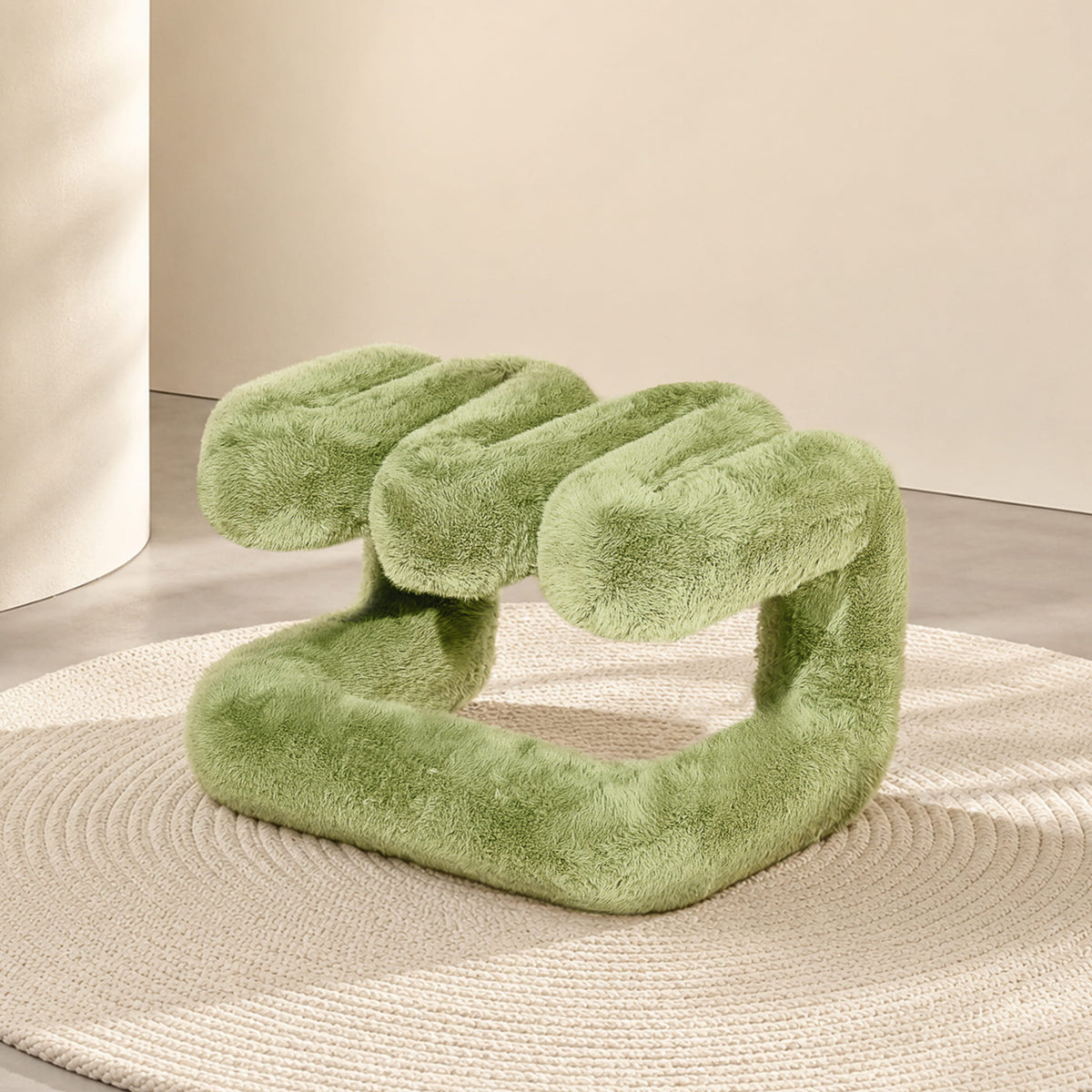 Sage green 36.5°C Series Plush Stool with a soft wave-like form in a minimalist interior.