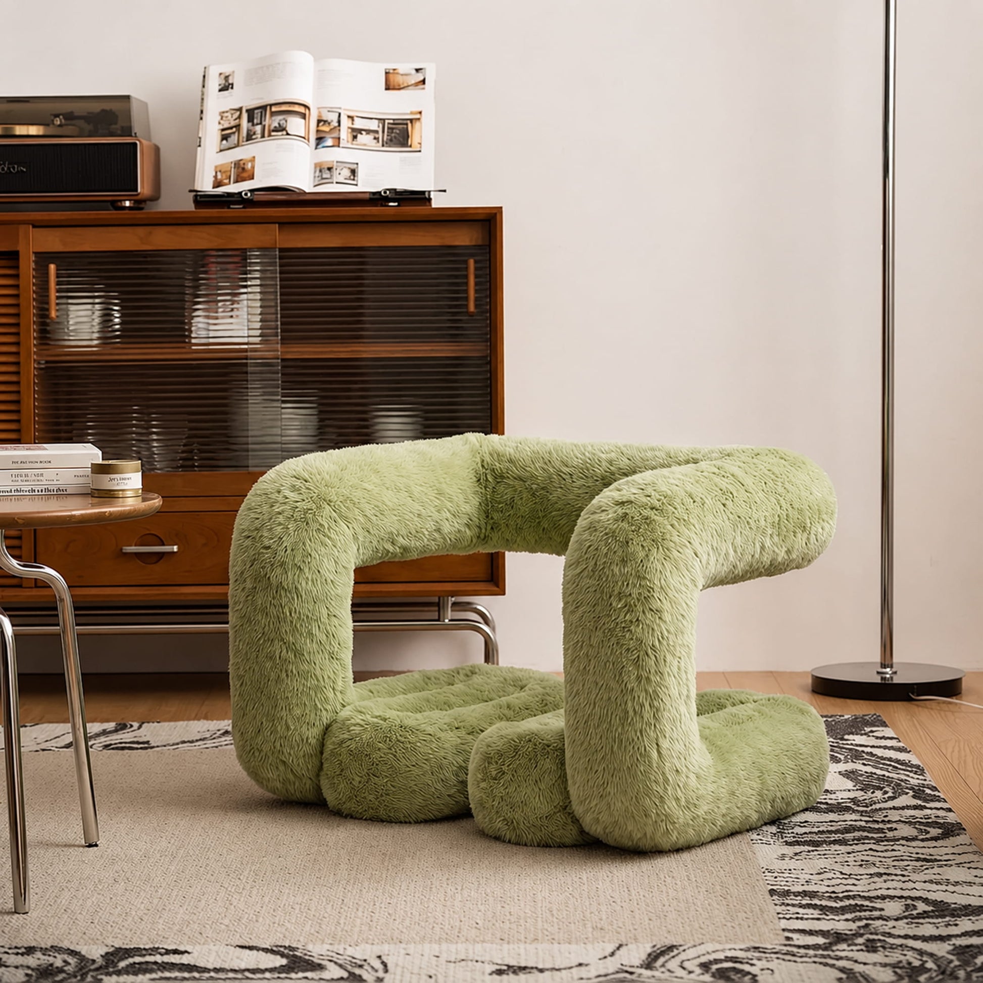Sage green 36.5°C Series Plush Stool styled with warm wood furniture in a retro modern interior.
