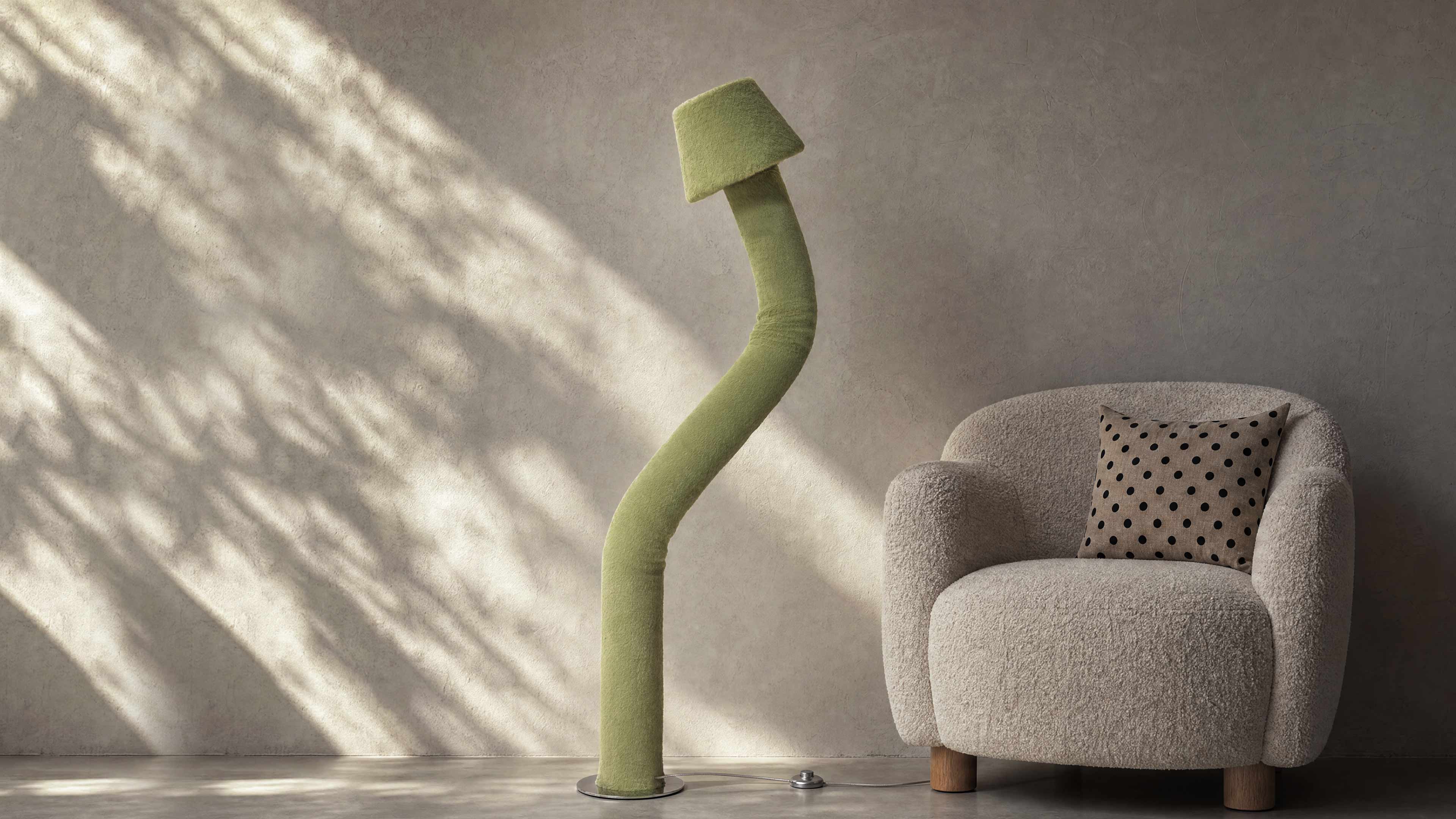 The ARTAMORE 36.5°C plush floor lamp featuring a flexible, modern organic design illuminating a warm minimalist living space.