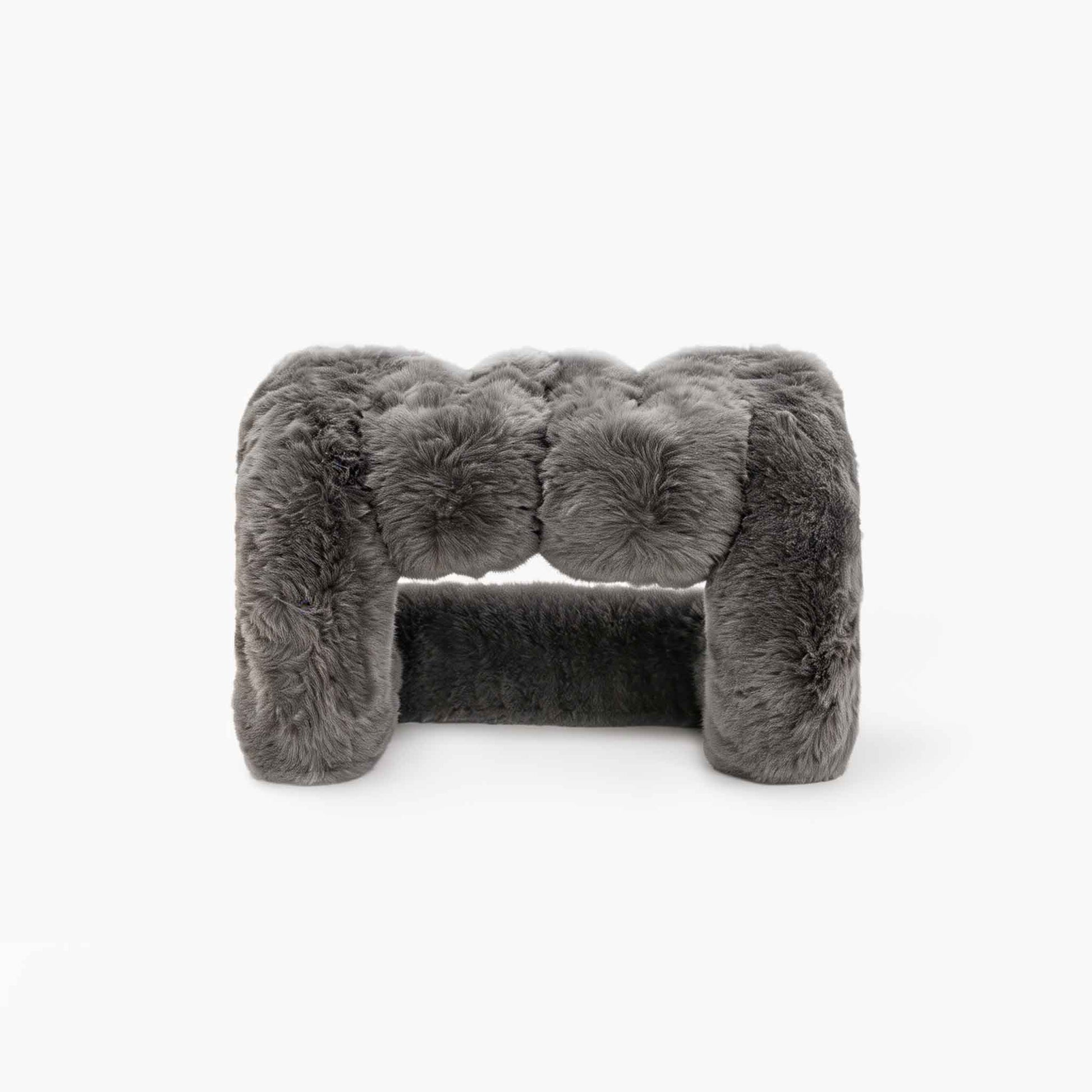 Elegant grey eco-fur lounge stool for modern organic interiors