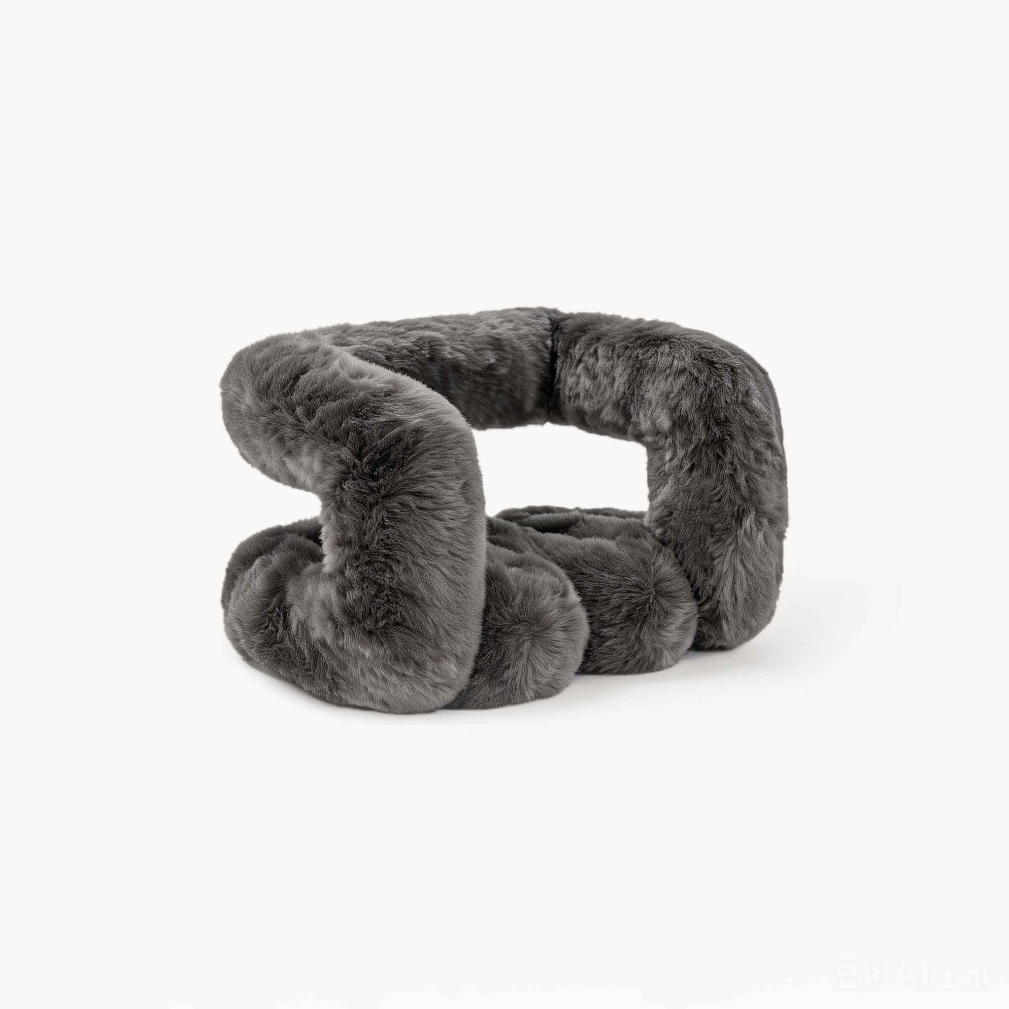 Close up of soft grey eco-fur material on modern stool