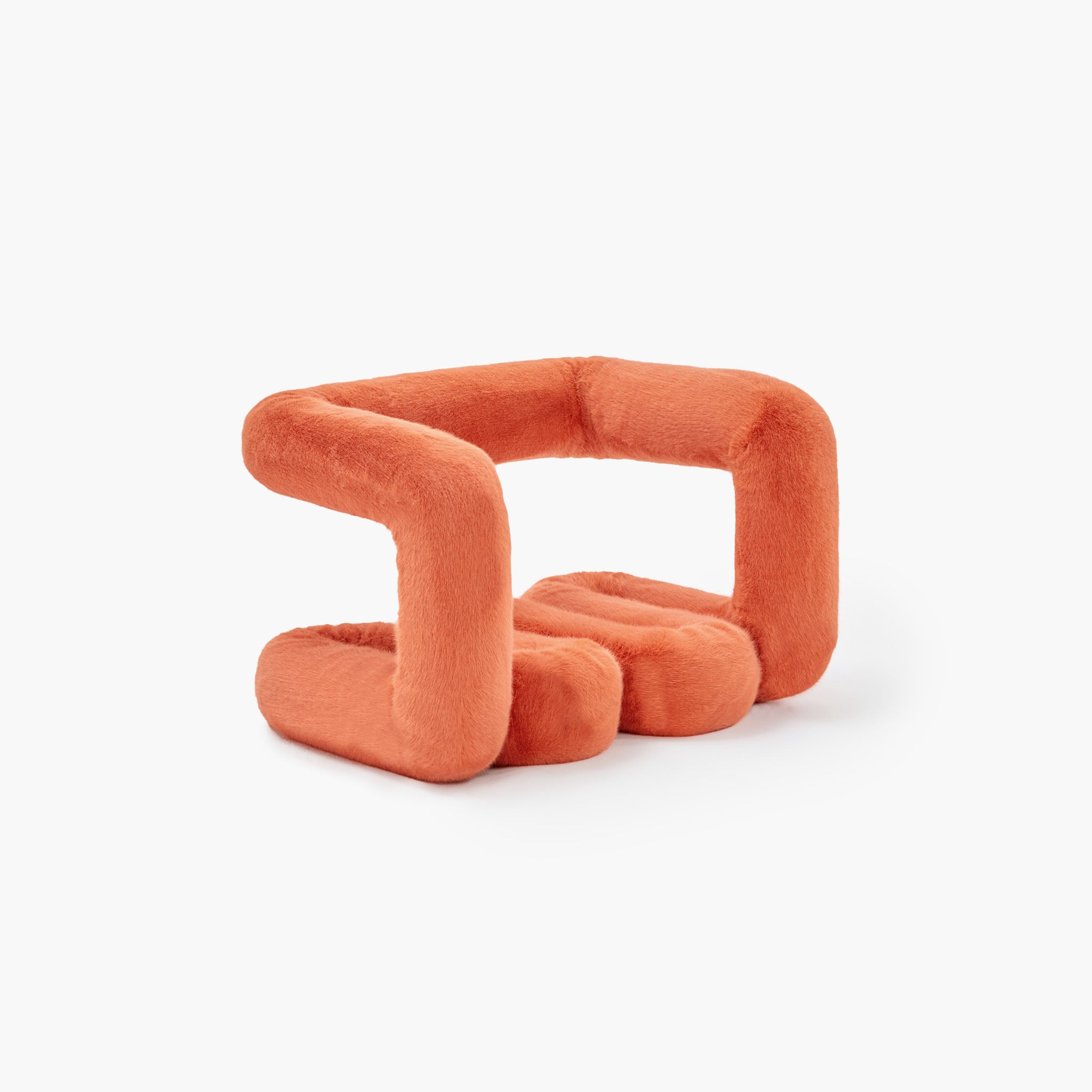 Hand-stitched detail of orange wave shaped ottoman