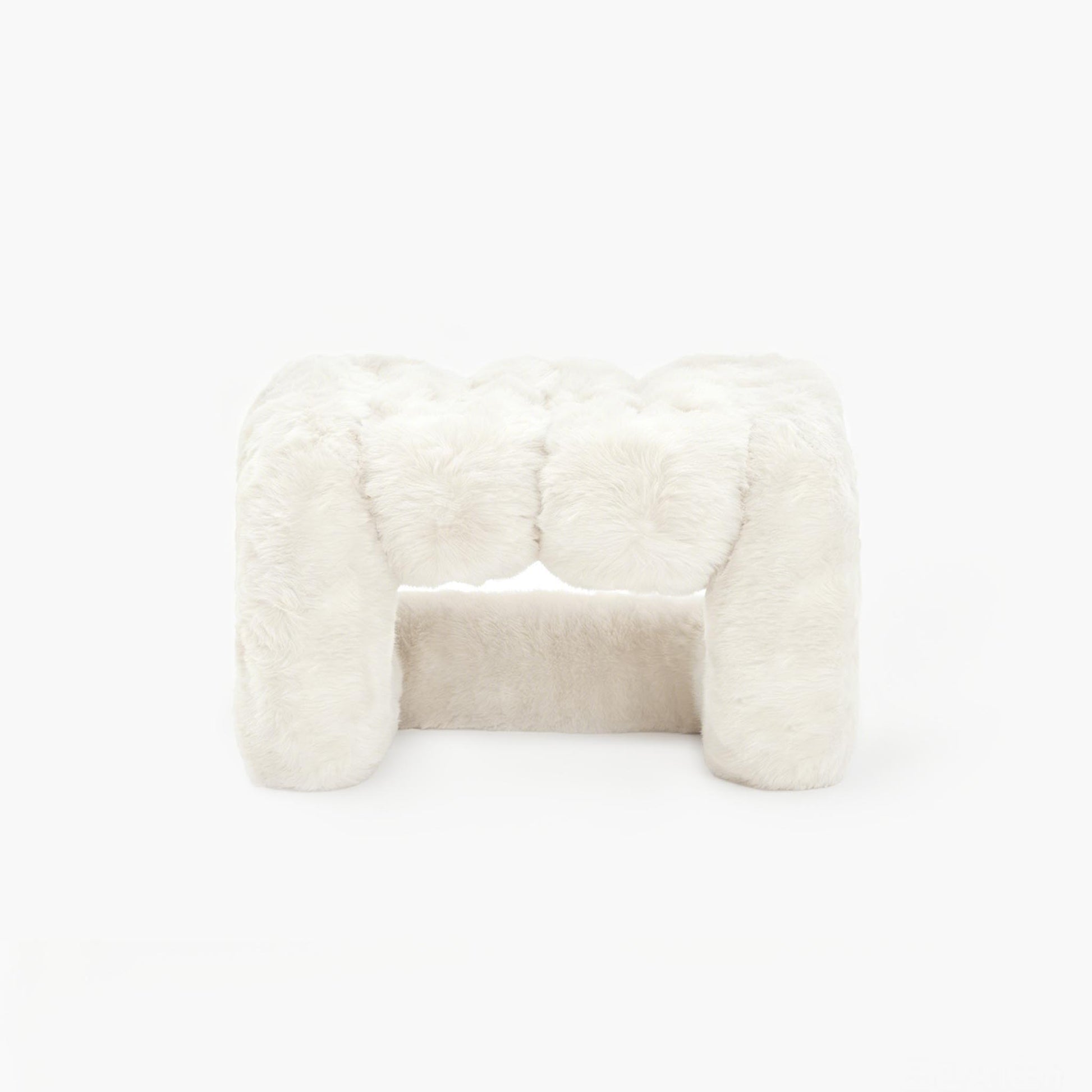 Elegant white eco-fur lounge stool for modern organic interiors