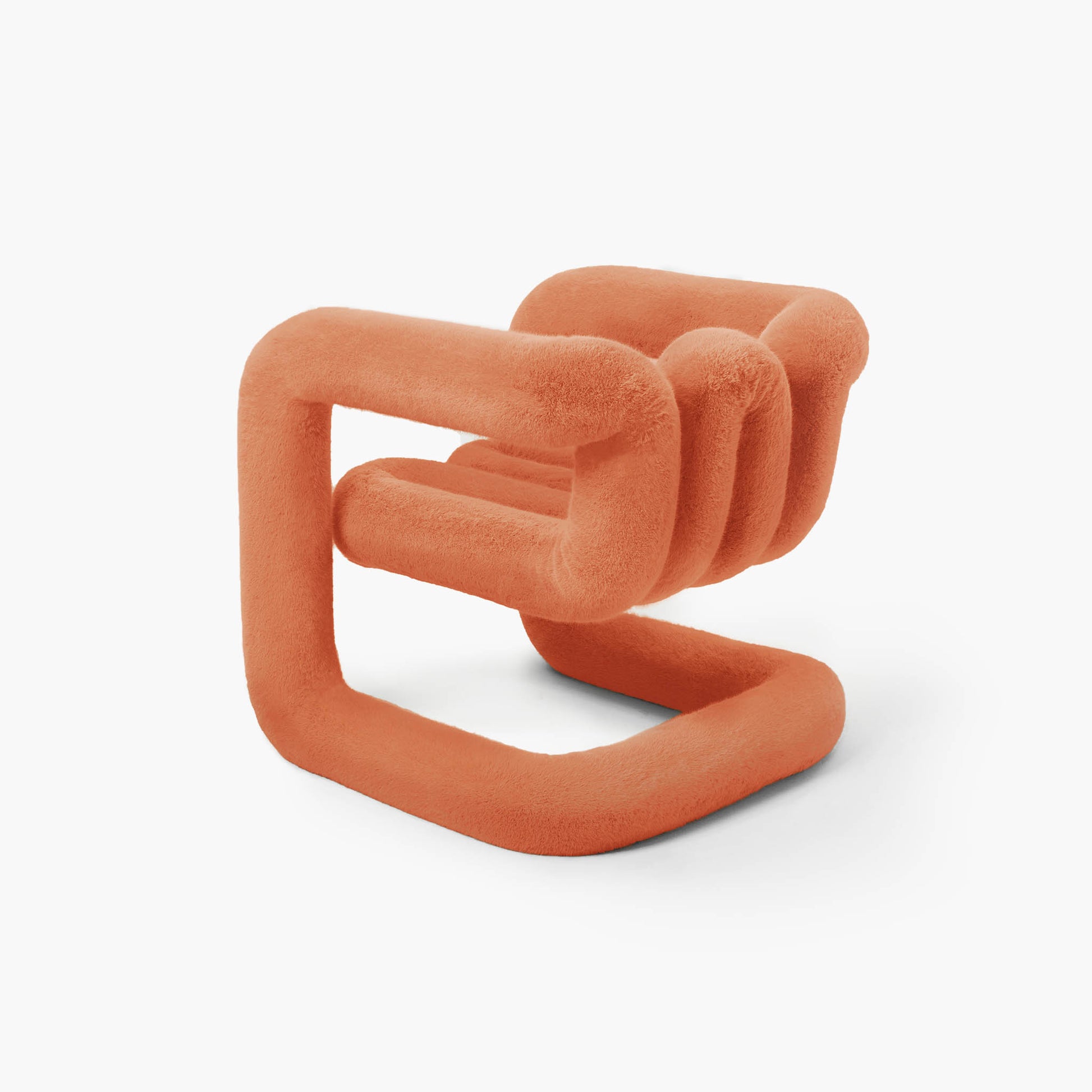 Reversible sculptural accent seating in warm orange faux fur