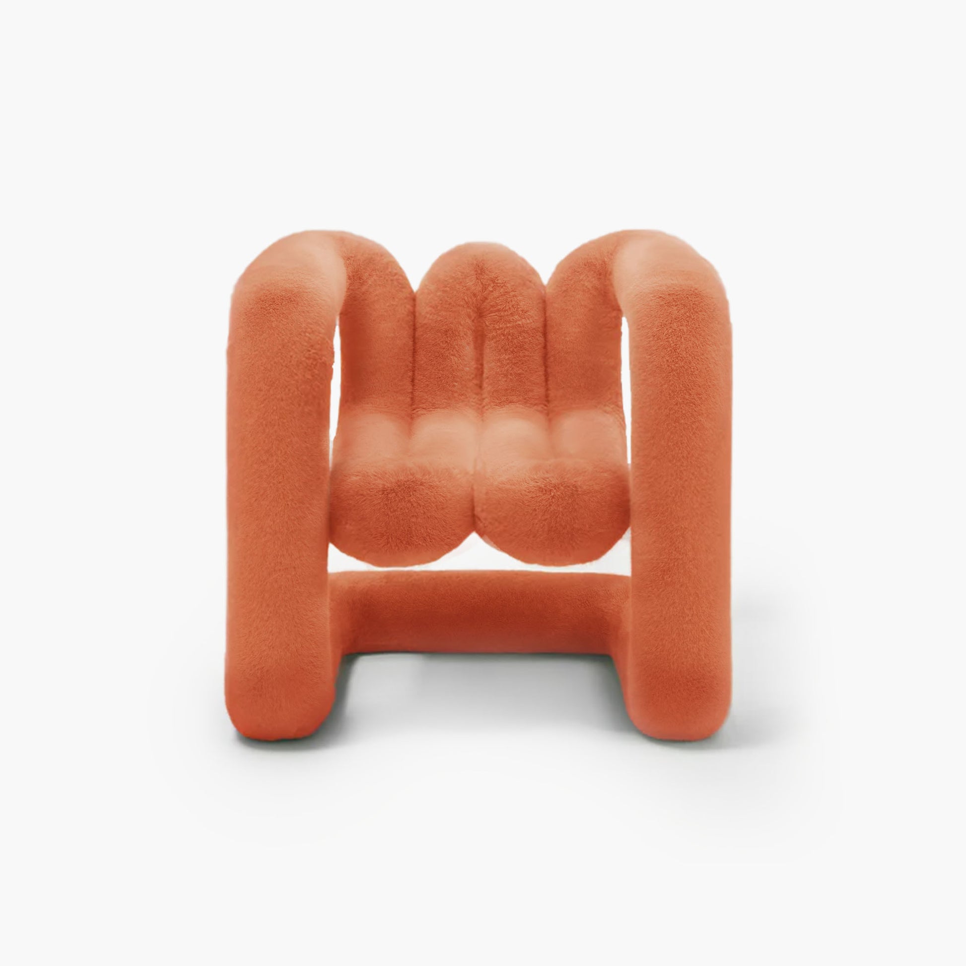 Amber orange rounded eco-fur lounge chair for modern interiors