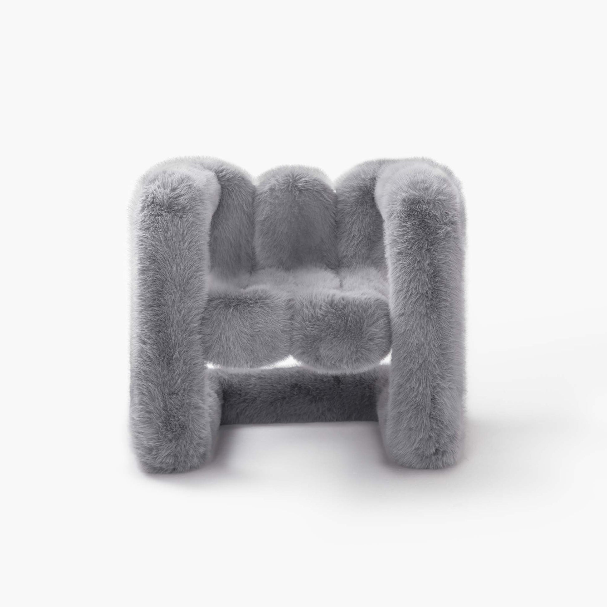 Tuffy grey plush eco-fur lounge chair with organic curves