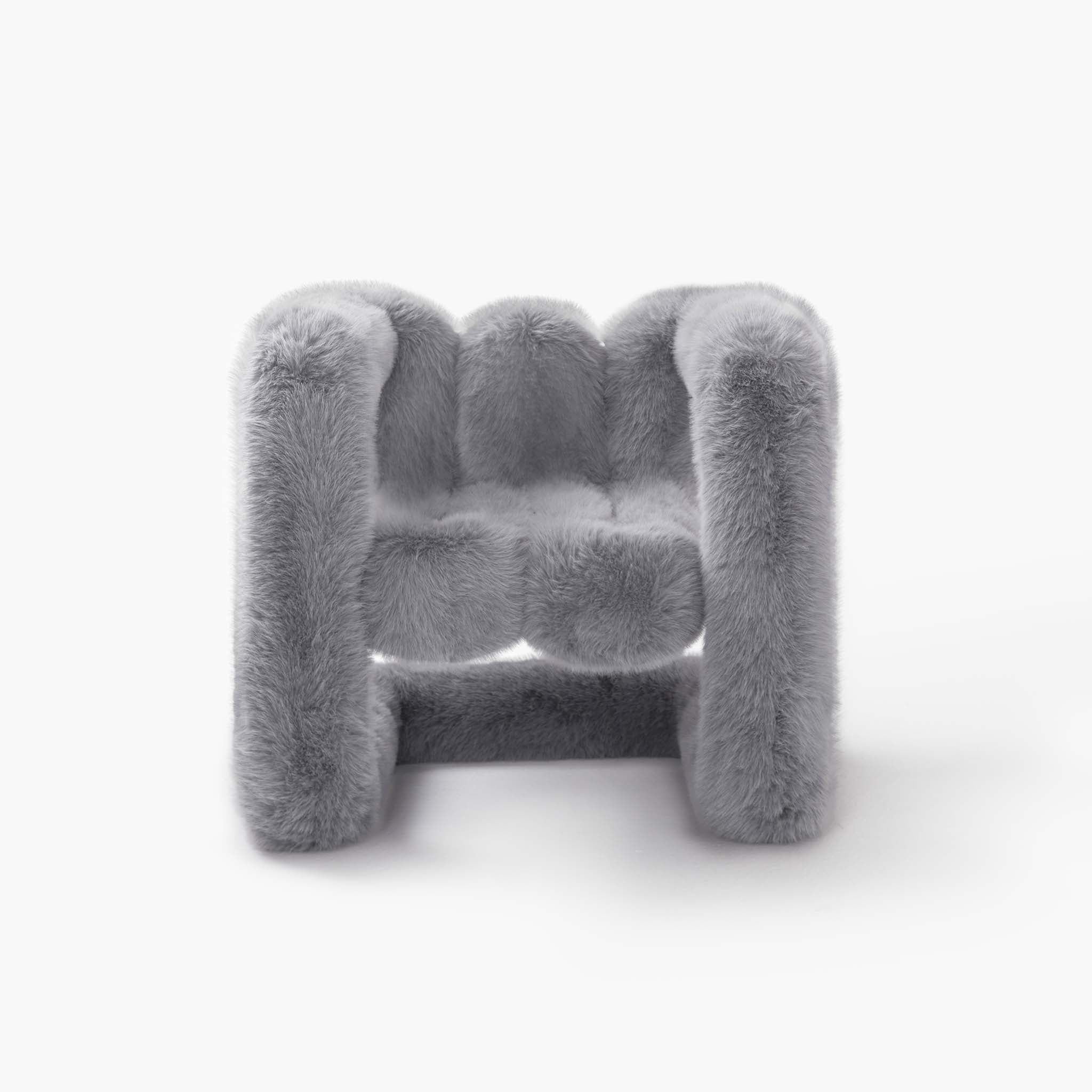 Tuffy grey plush eco-fur lounge chair with organic curves