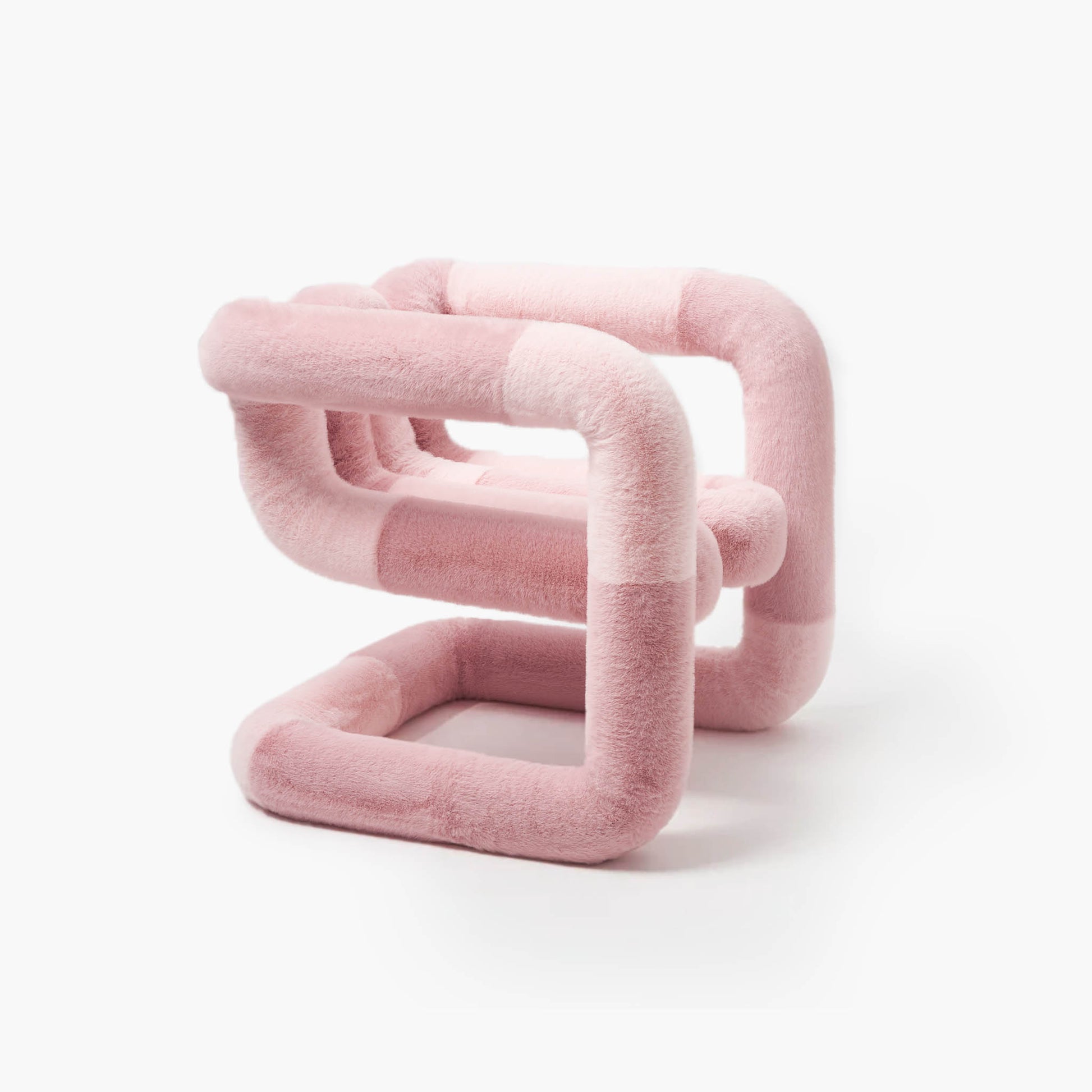 Sculptural minimalist pink accent chair in premium faux fur
