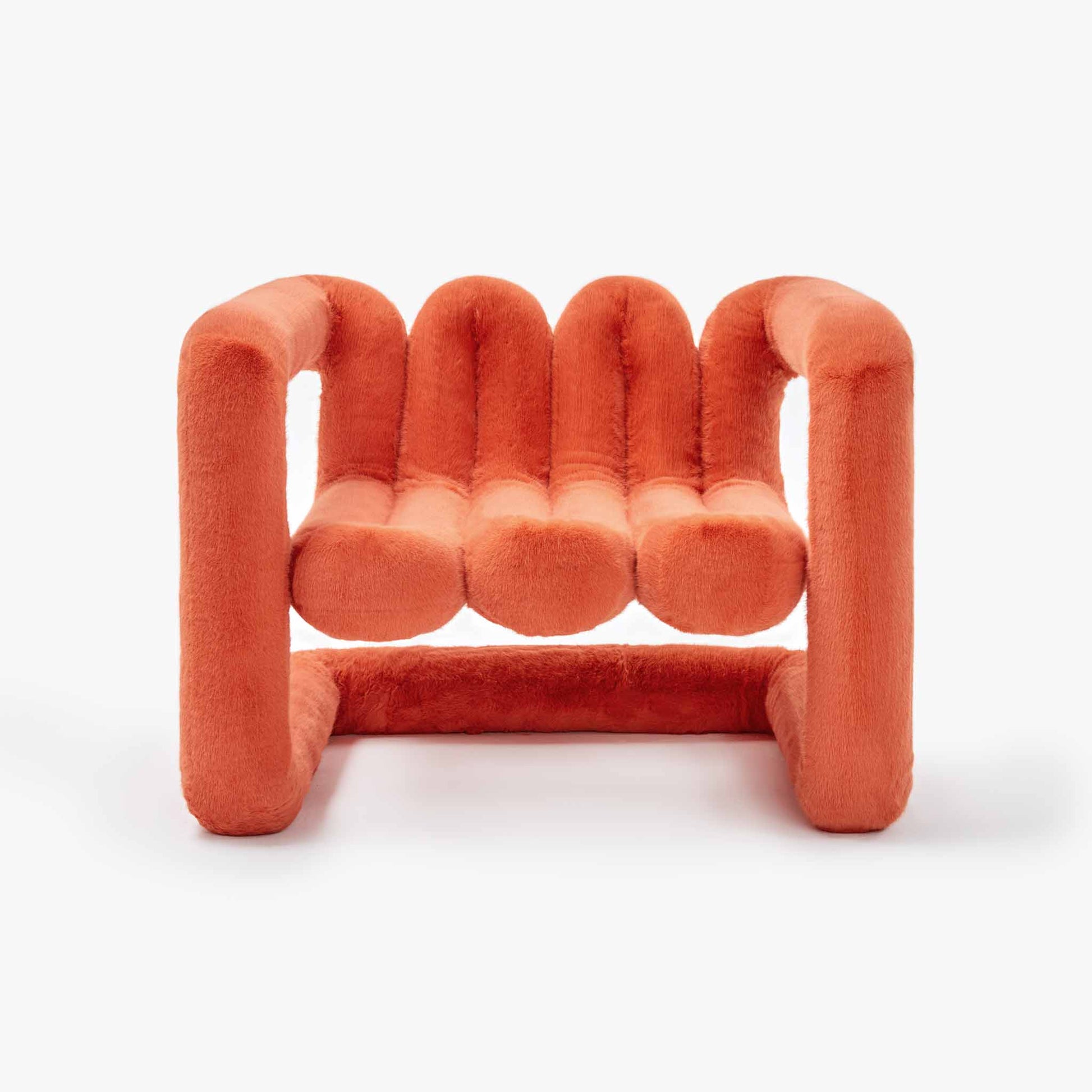 Amber orange oversized cantilevered eco-fur chair front view