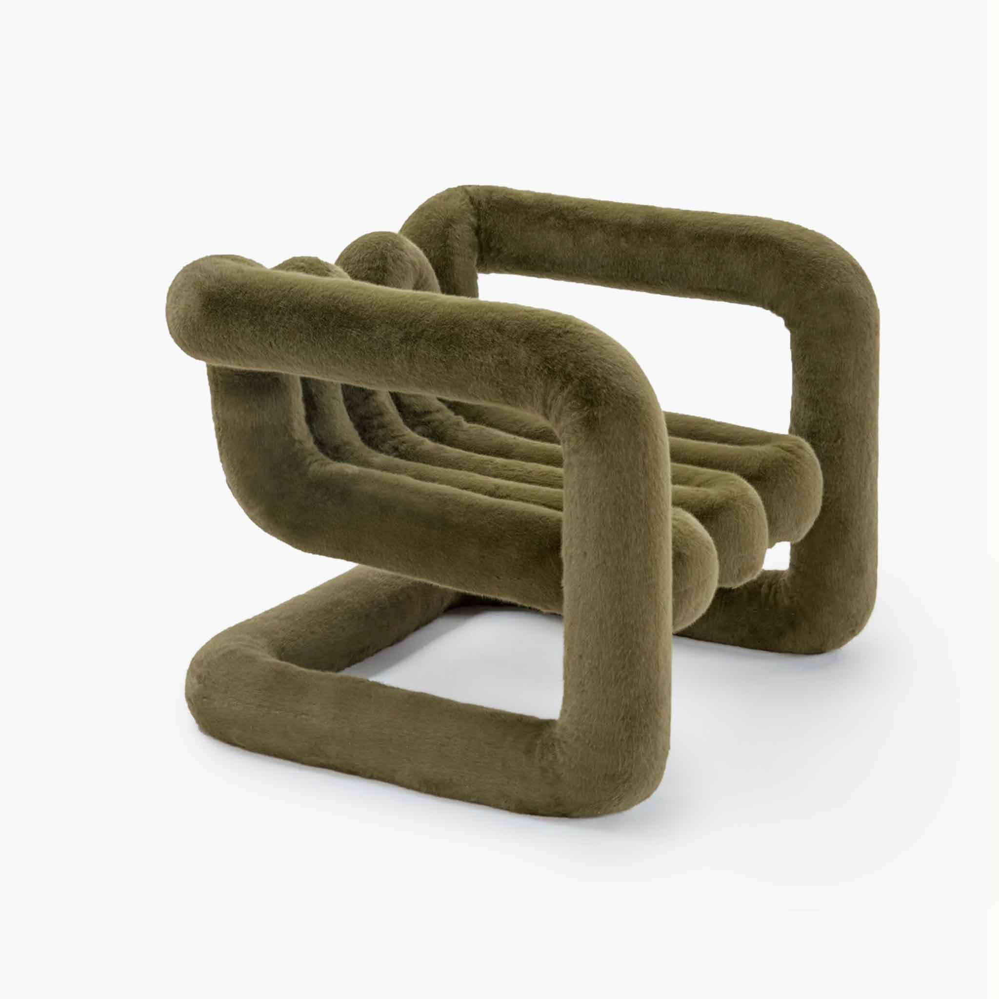 Detailed view of the soft green eco-fur seating texture
