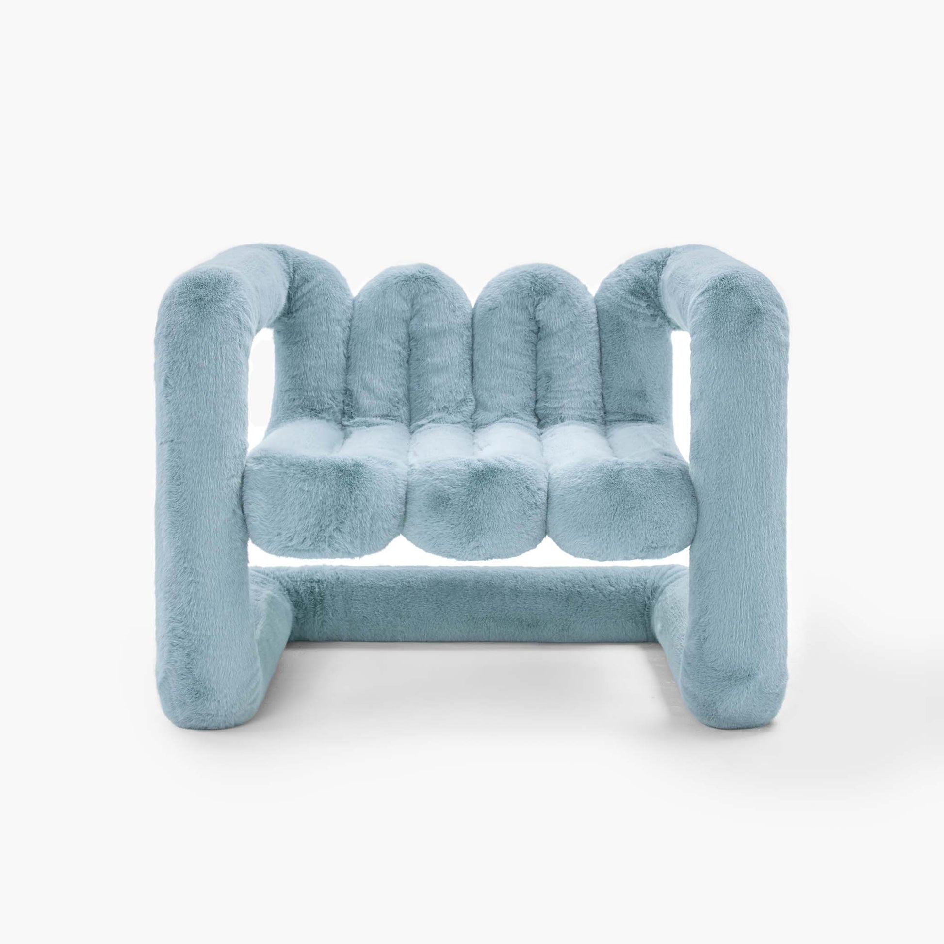 Slate blue oversized cantilevered eco-fur chair for contemporary spaces