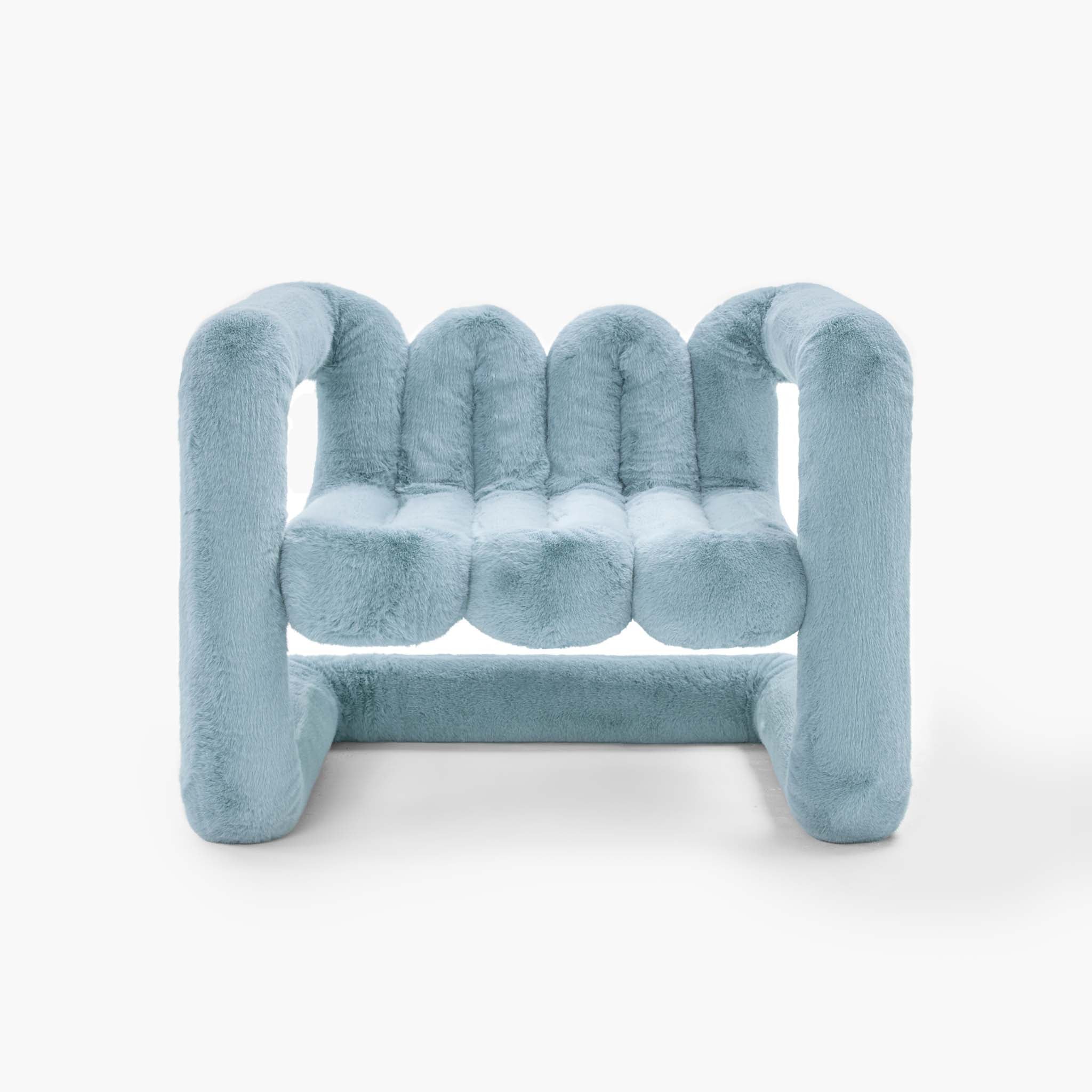 Slate blue oversized cantilevered eco-fur chair for contemporary spaces