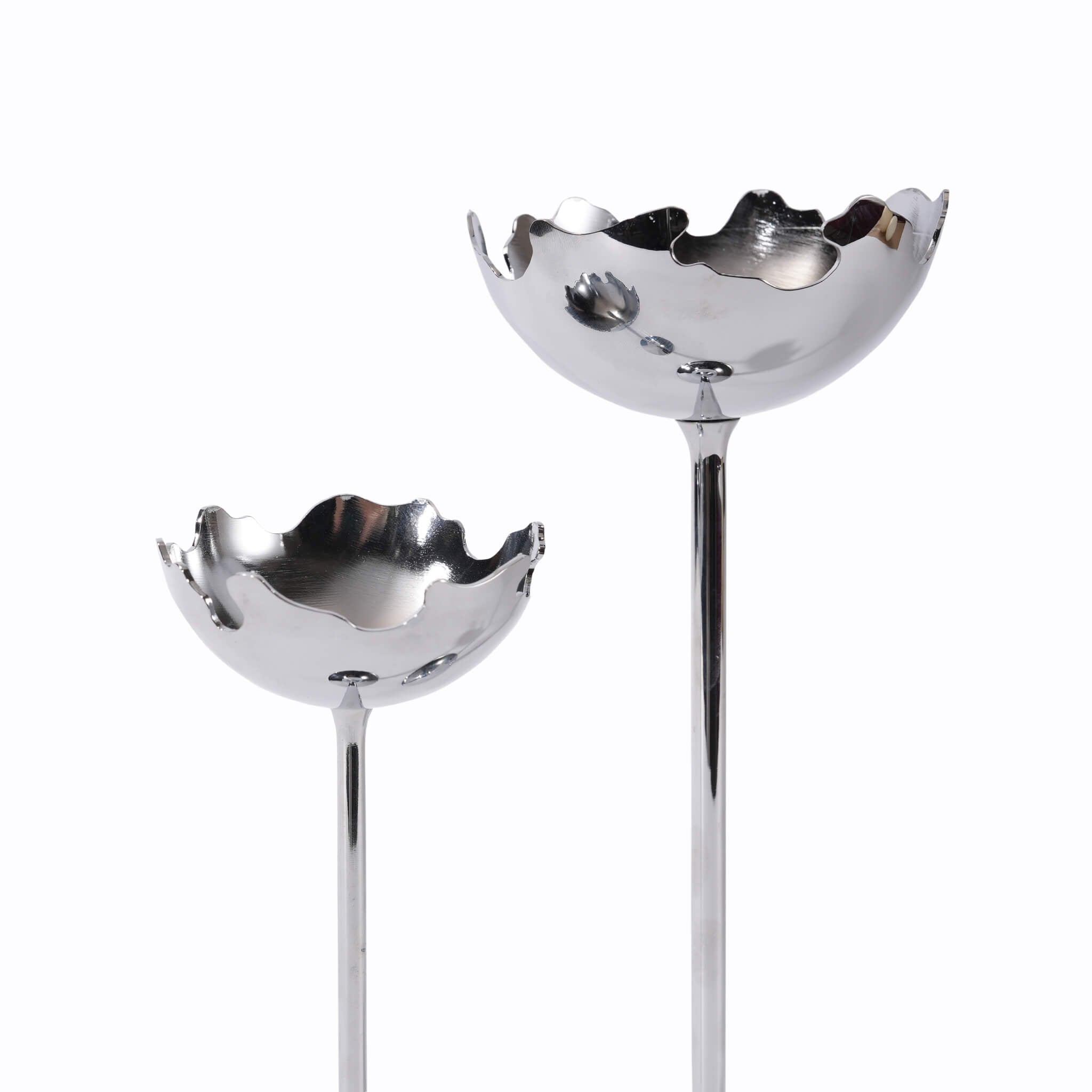 Detail shot highlighting the hand-finished, irregular edges of the metallic eggshell candle holder capturing a raw aesthetic