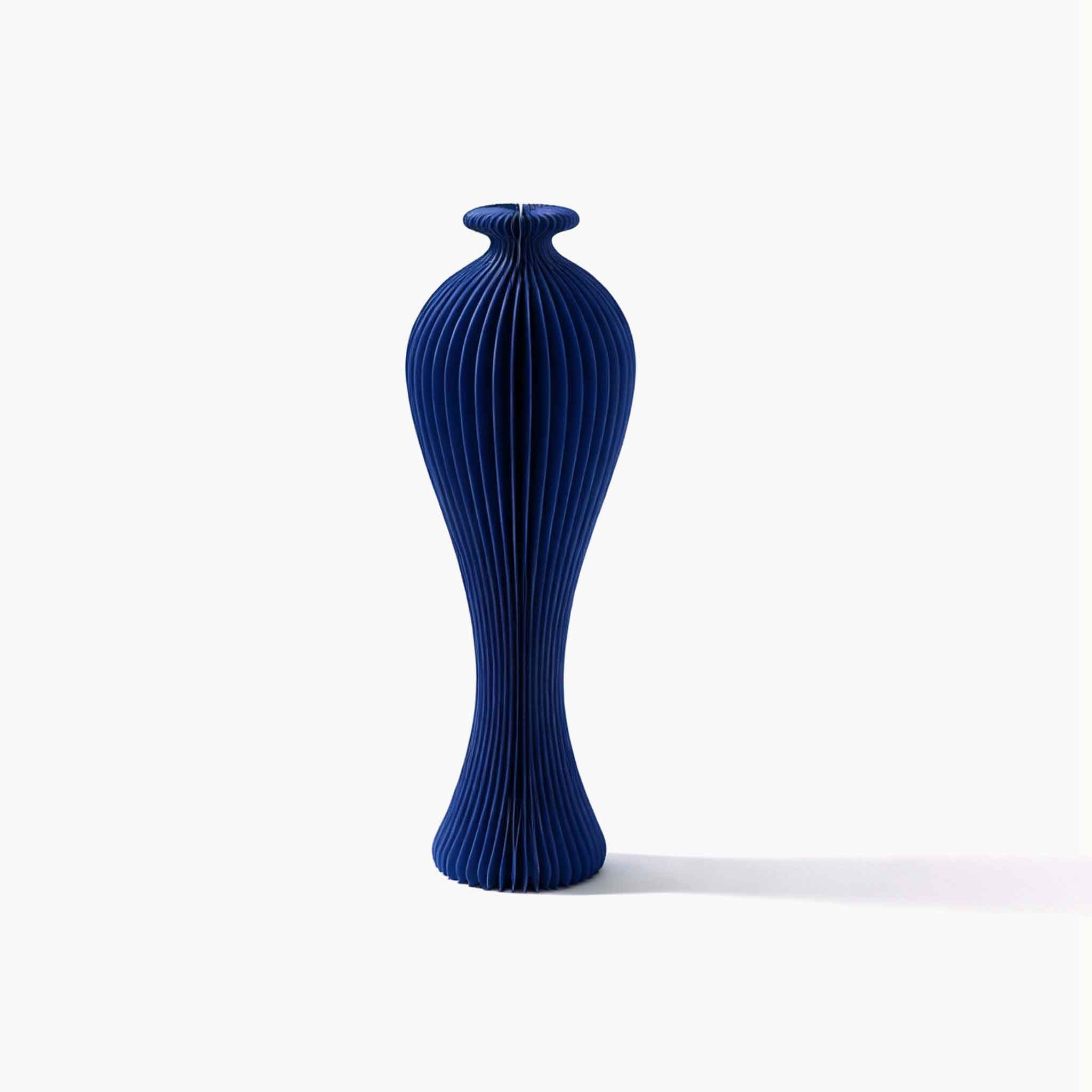 Modern blue honeycomb paper decorative vase, perfect for curating fresh or dried floral displays in style.