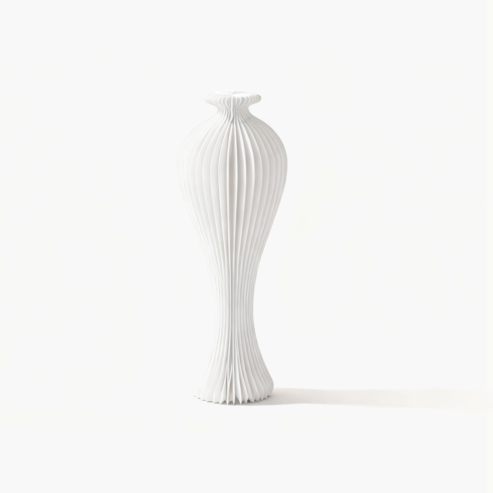 Minimalist white foldable kraft paper vase, an essential centerpiece for a warm modern organic home aesthetic.