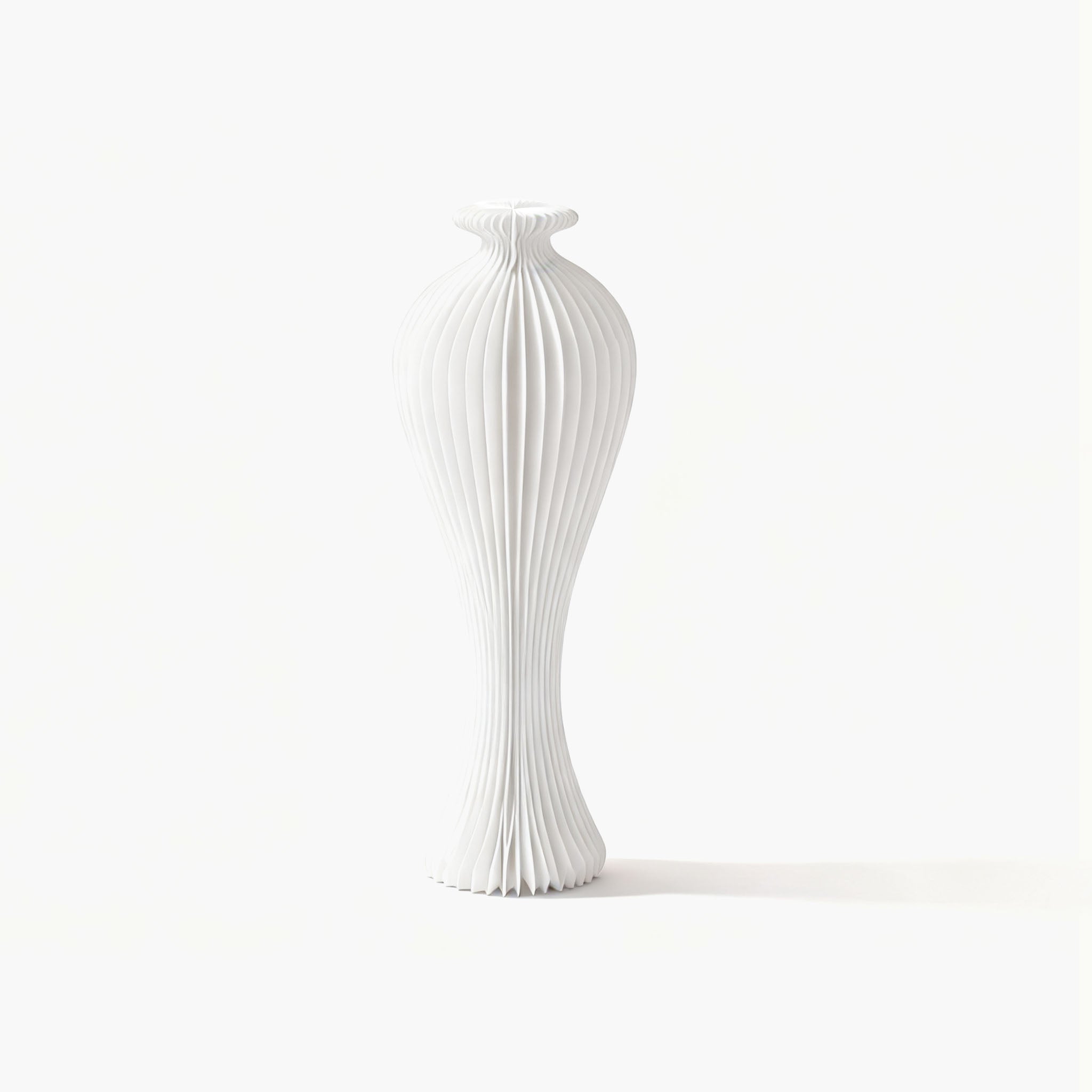 Minimalist white foldable kraft paper vase, an essential centerpiece for a warm modern organic home aesthetic.