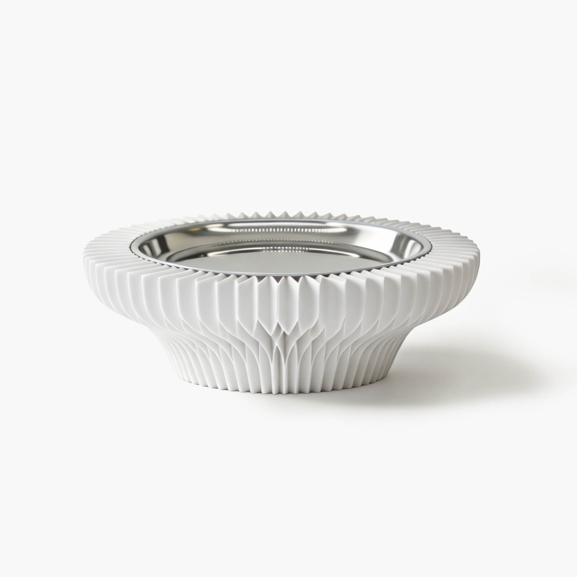 Minimalist white accordion paper pedestal tray featuring a premium matte metal dish.