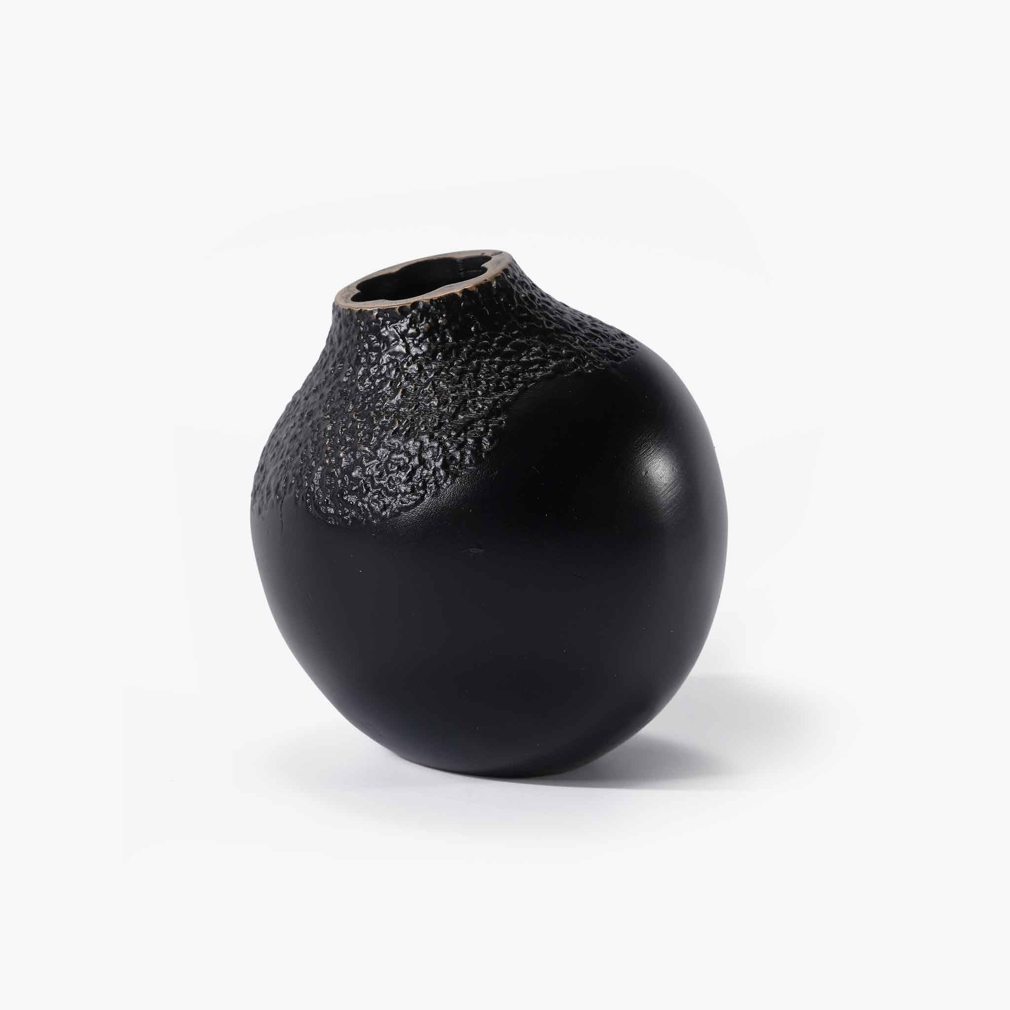 Front view of the ARTAMORE solid brass acorn vase in black, highlighting its compact, rounded silhouette inspired by nature