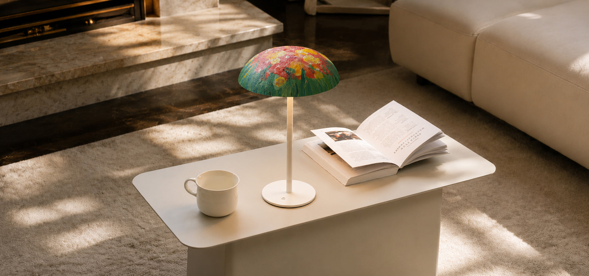 Colorful floral mushroom table lamp on a white coffee table in a warm contemporary living room by Artamore.