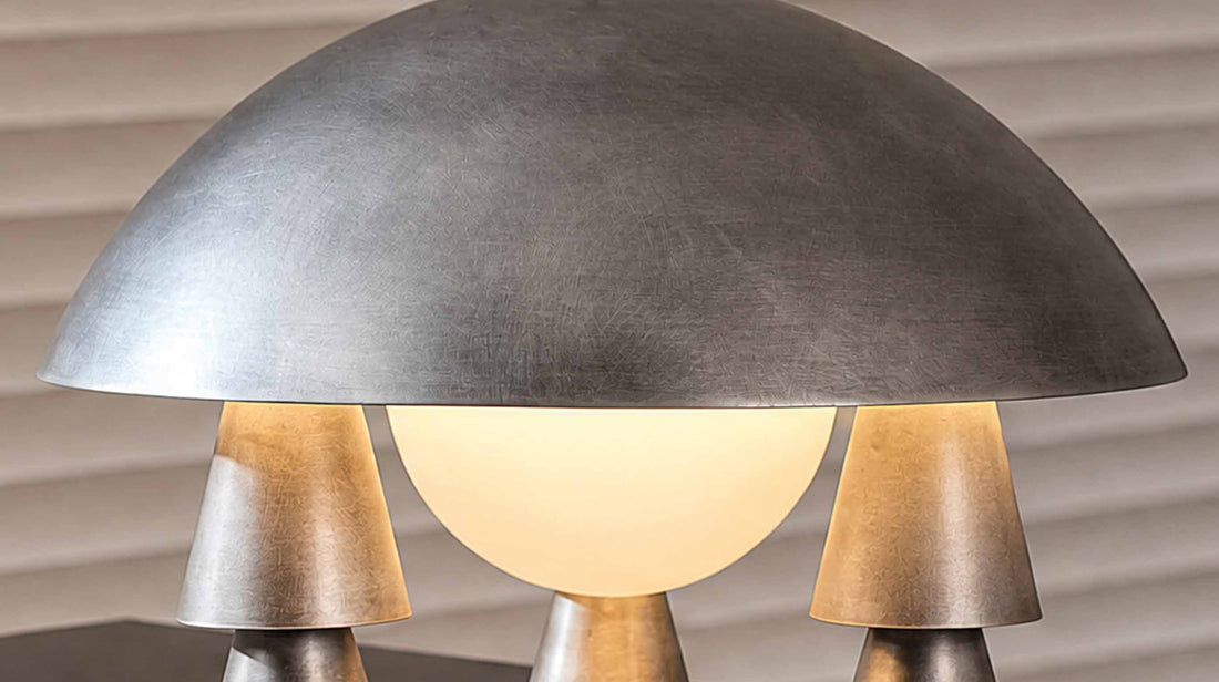 The milky-white frosted glass shade of the artamore metal lamp diffuses light softly, setting a calm, non-glare mood in a wabi-sabi living space.