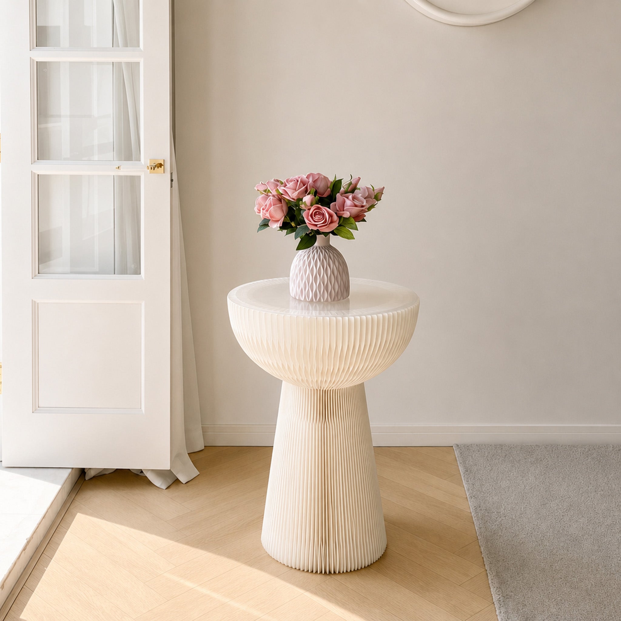 White Bouquet Side Table B styled with pink flowers in a bright contemporary interior.
