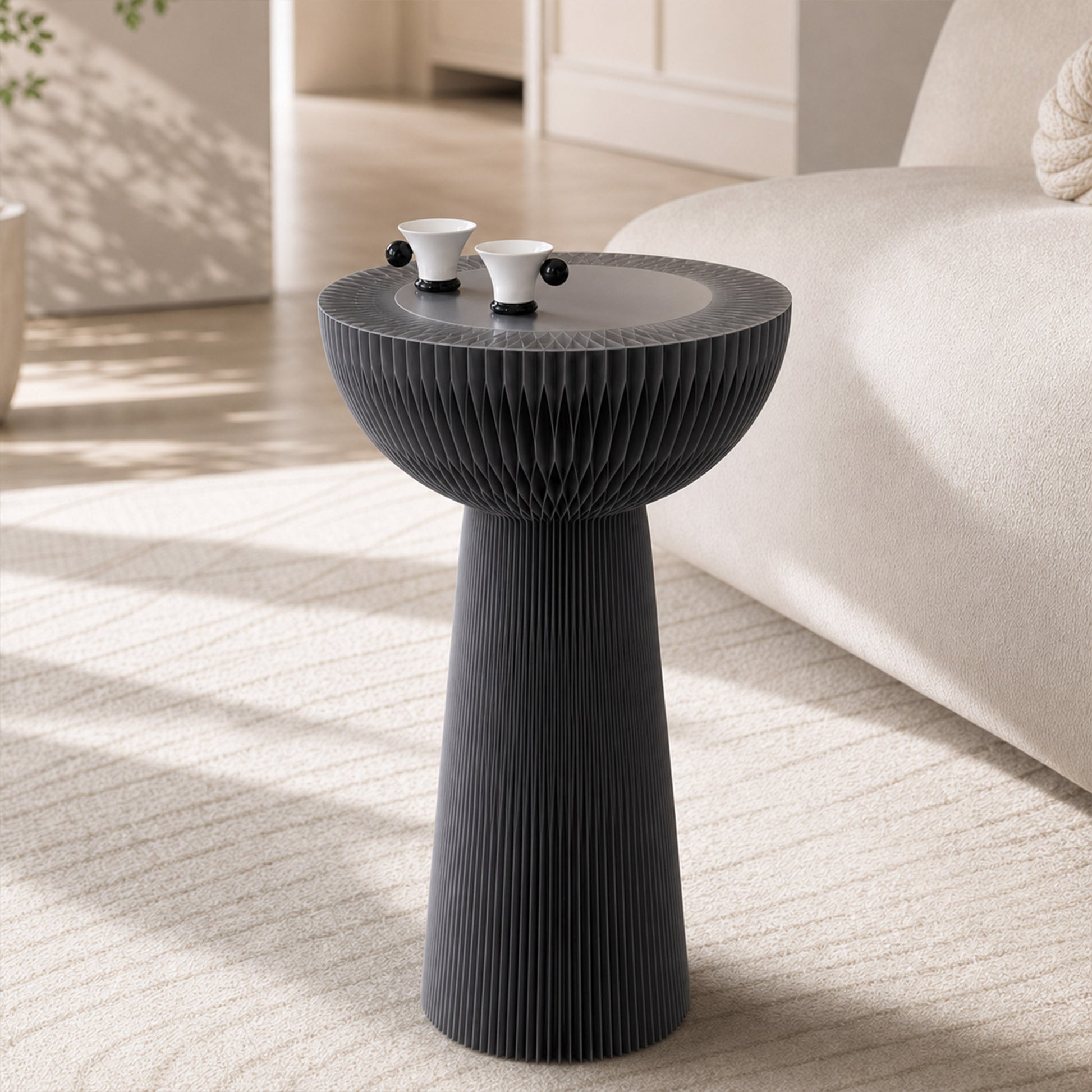 Grey Bouquet Side Table C with a frosted tabletop styled beside a cream sofa with two small cups.