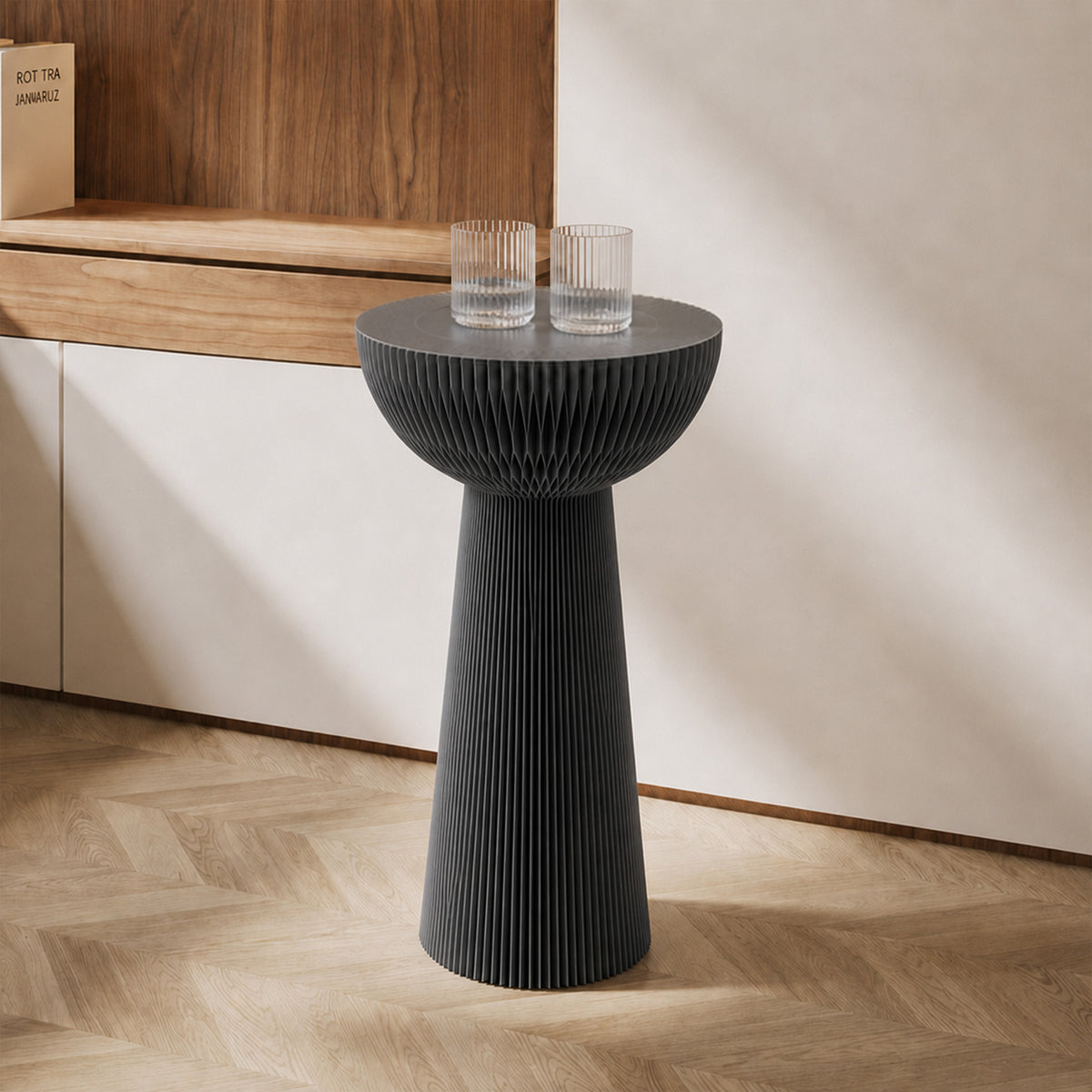 Grey Bouquet Side Table C with a tall honeycomb paper silhouette styled with two glasses in a modern living space.