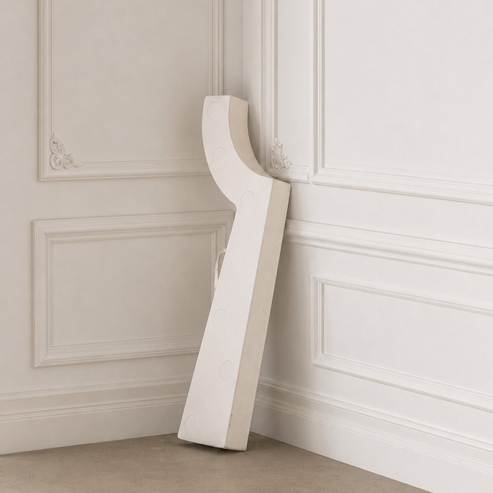 White Bouquet Side Table C folded into a slim profile for compact indoor storage.