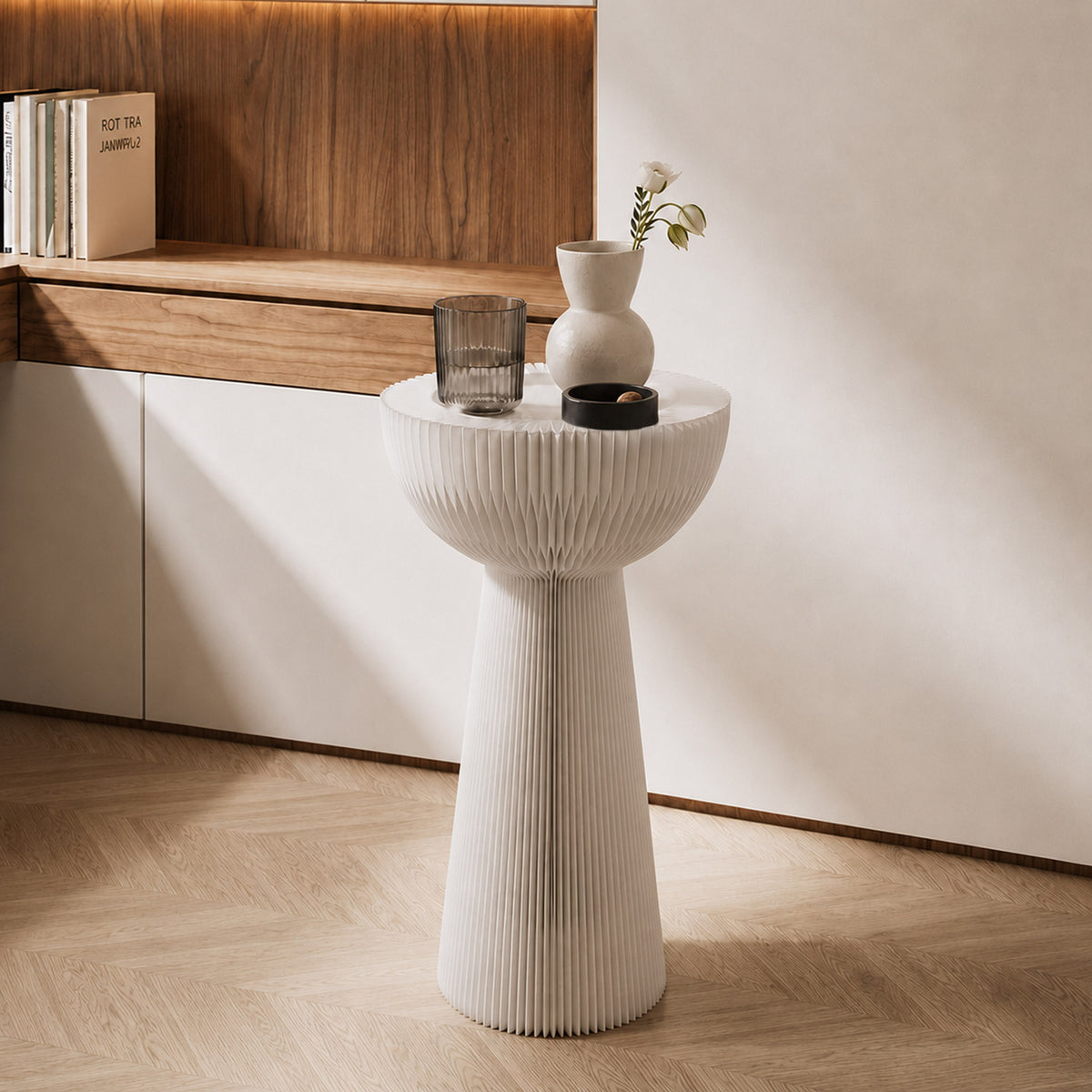 White Bouquet Side Table C with a tall sculptural honeycomb paper form styled with a vase and glass in a modern interior.