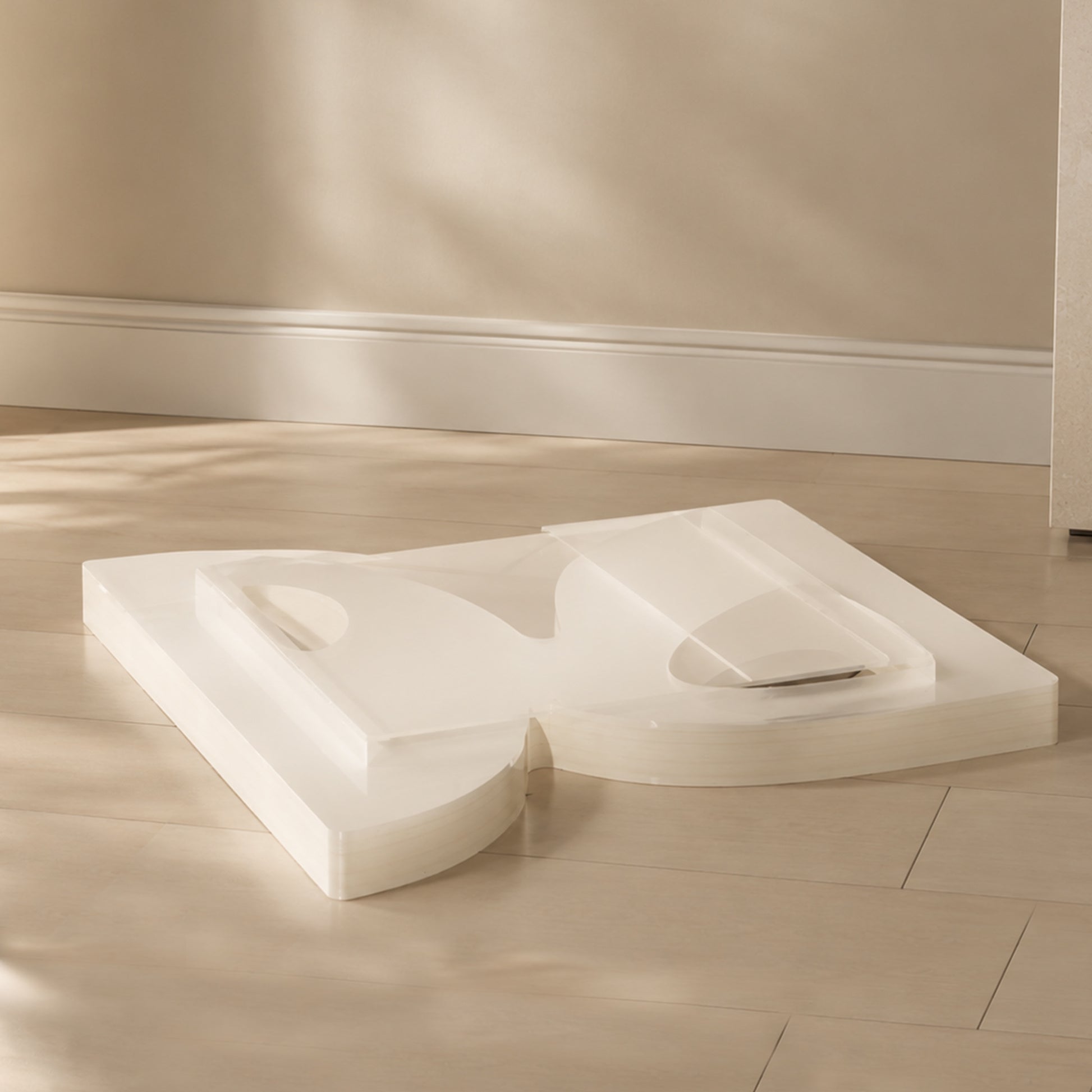 Large BUTTERFLY side cabinet folded flat on a wooden floor for compact storage.