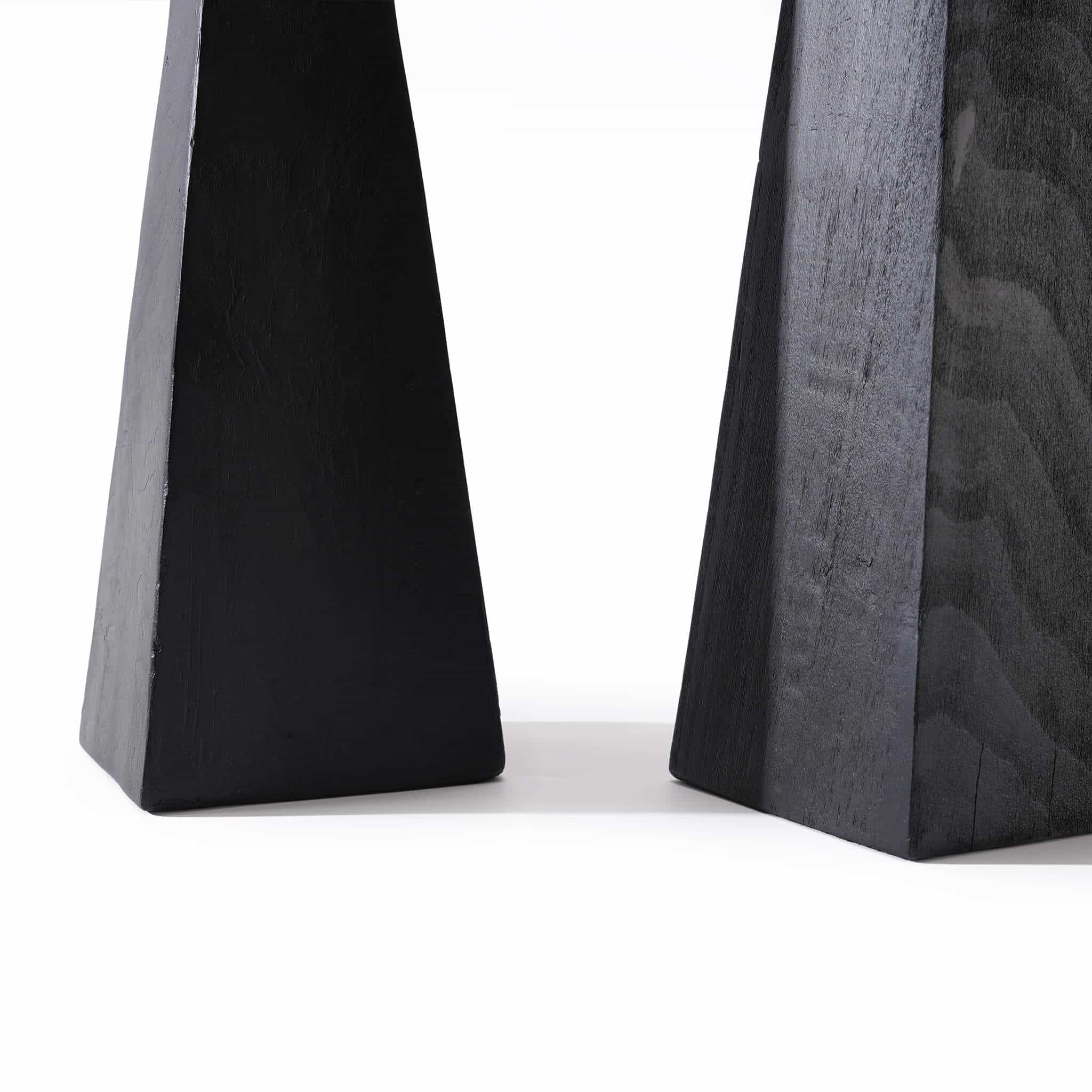 Close up of the natural knot grain on the geometric wooden candlestick base