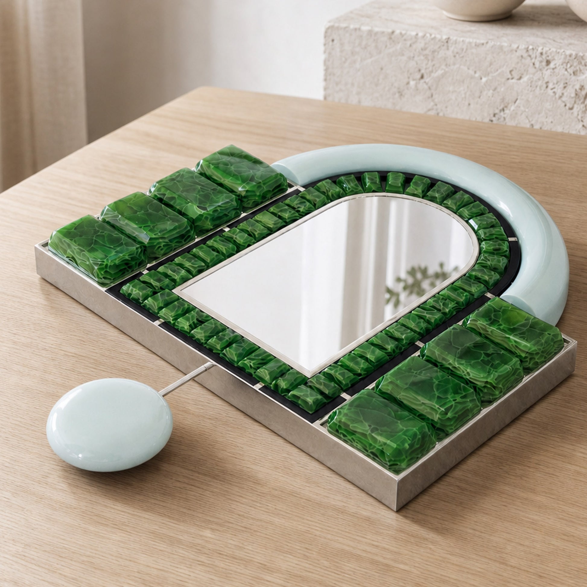 Top view of Artamore Celebrity Mirror with Art Deco green glass frame and integrated hanging accent.