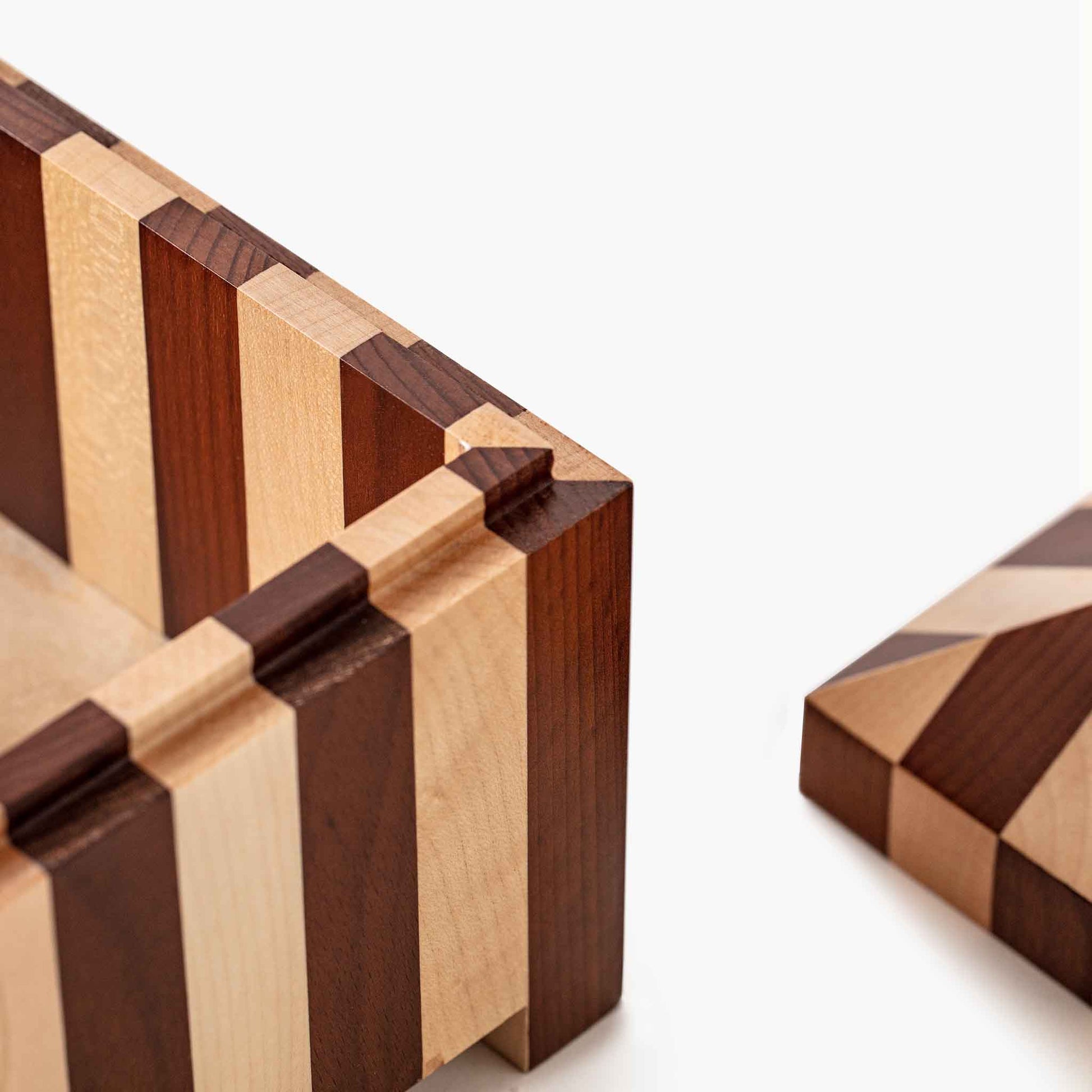 Close-up of meticulous interlocking wood joint craft and polished edges